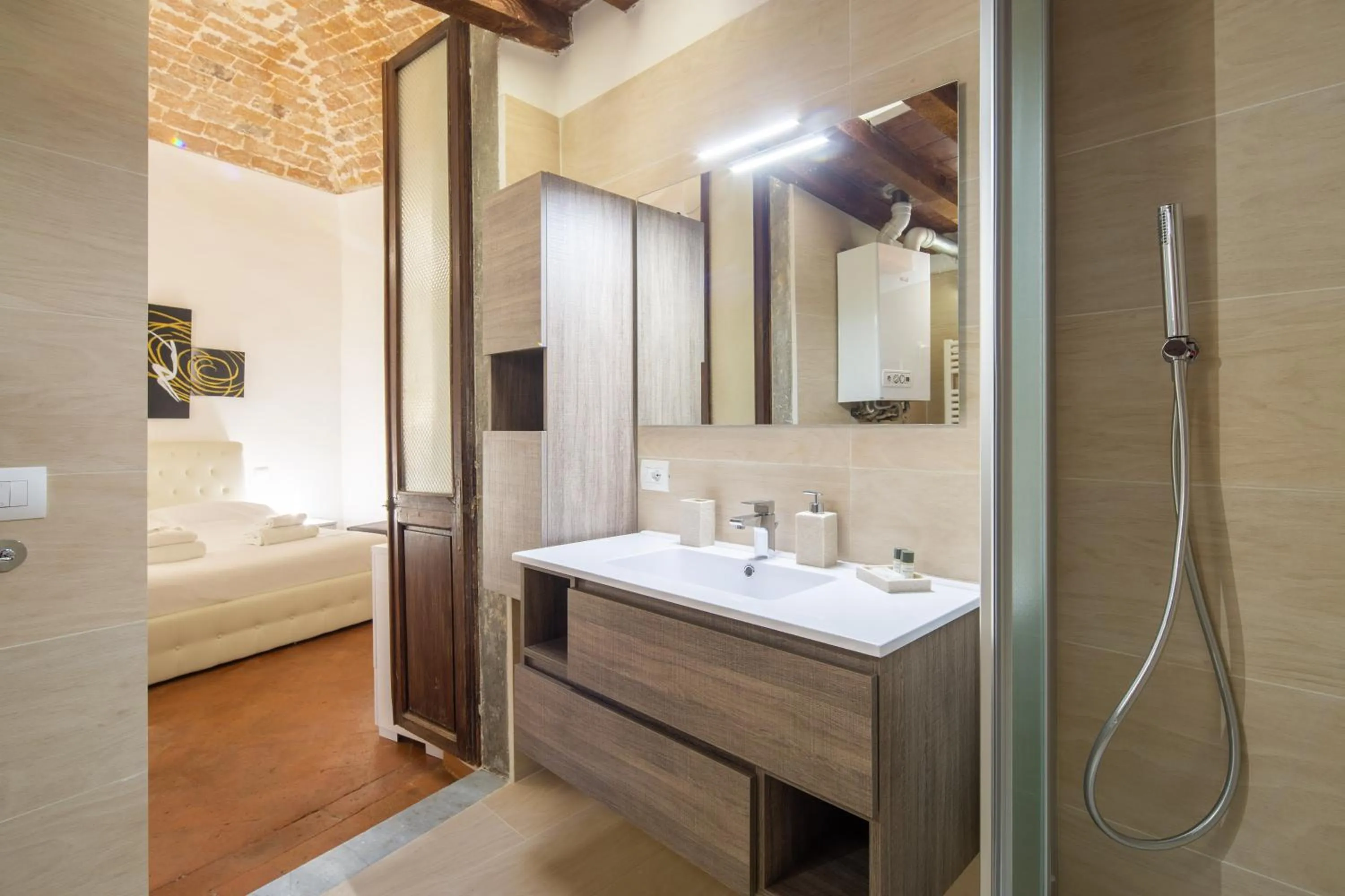 Bathroom, Bed in Lian Home in Florence by Mmega