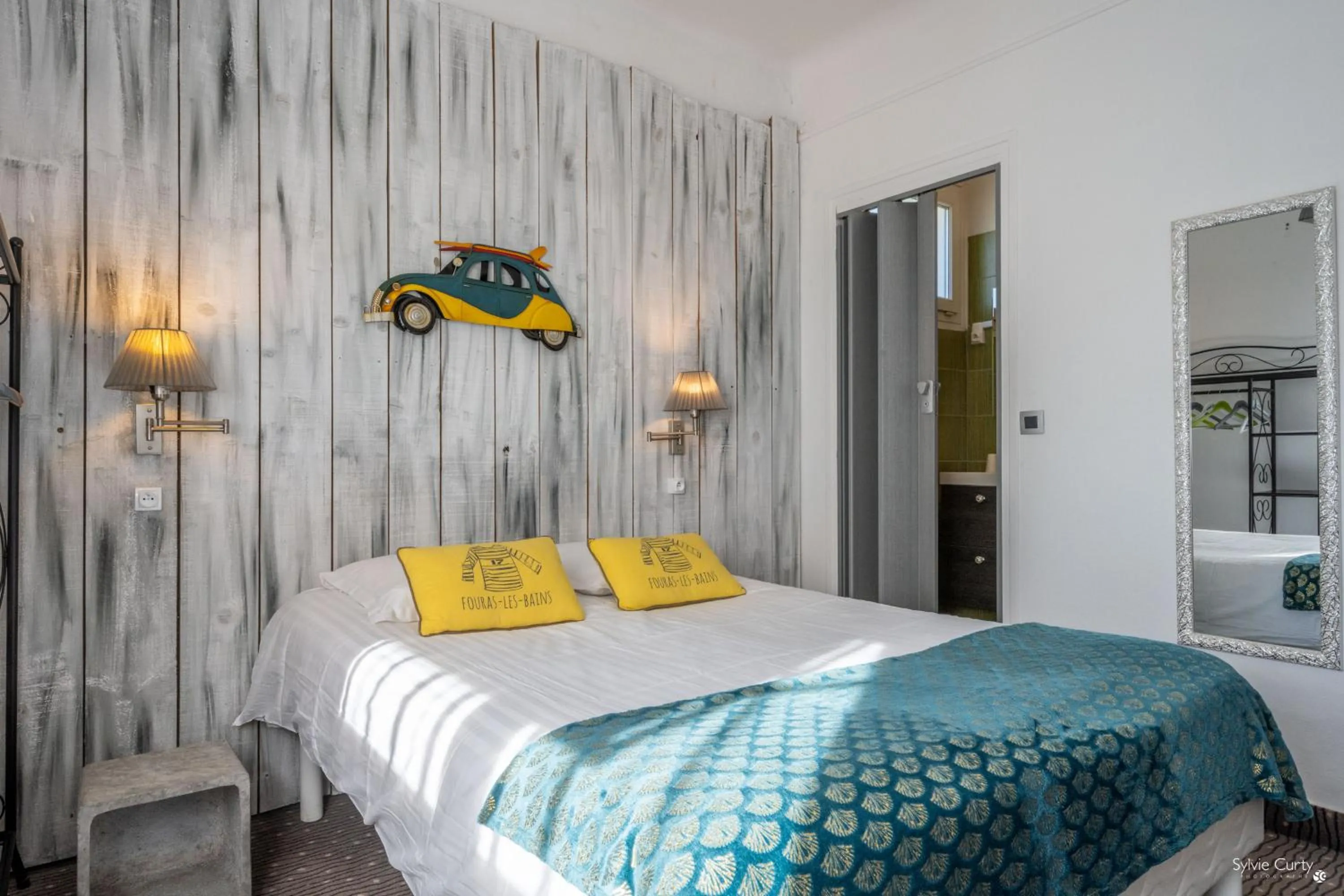 Bed in Hotel La Roseraie