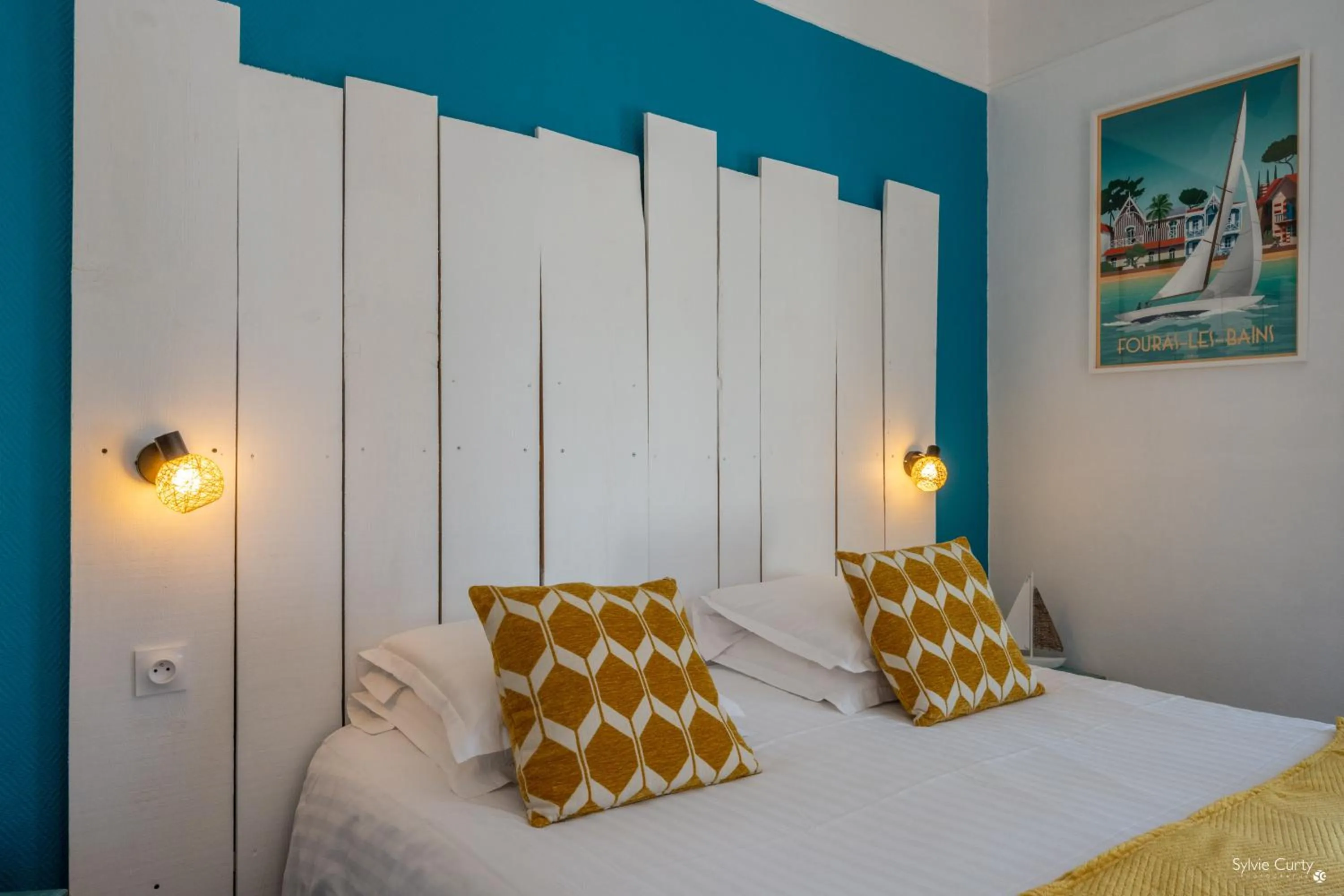 Bed in Hotel La Roseraie