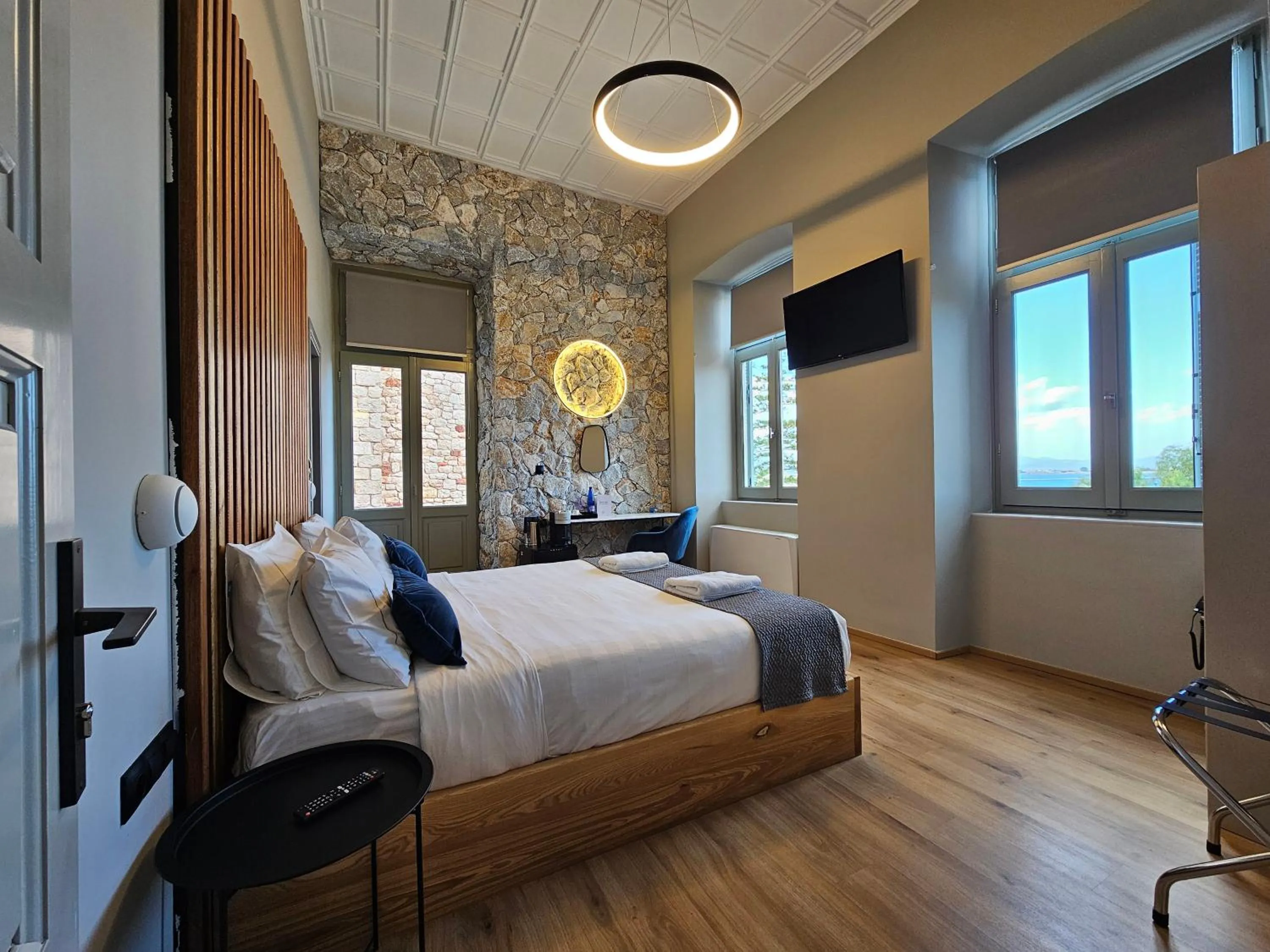 Photo of the whole room, Bed in Impero Nafplio Hotel & Suites