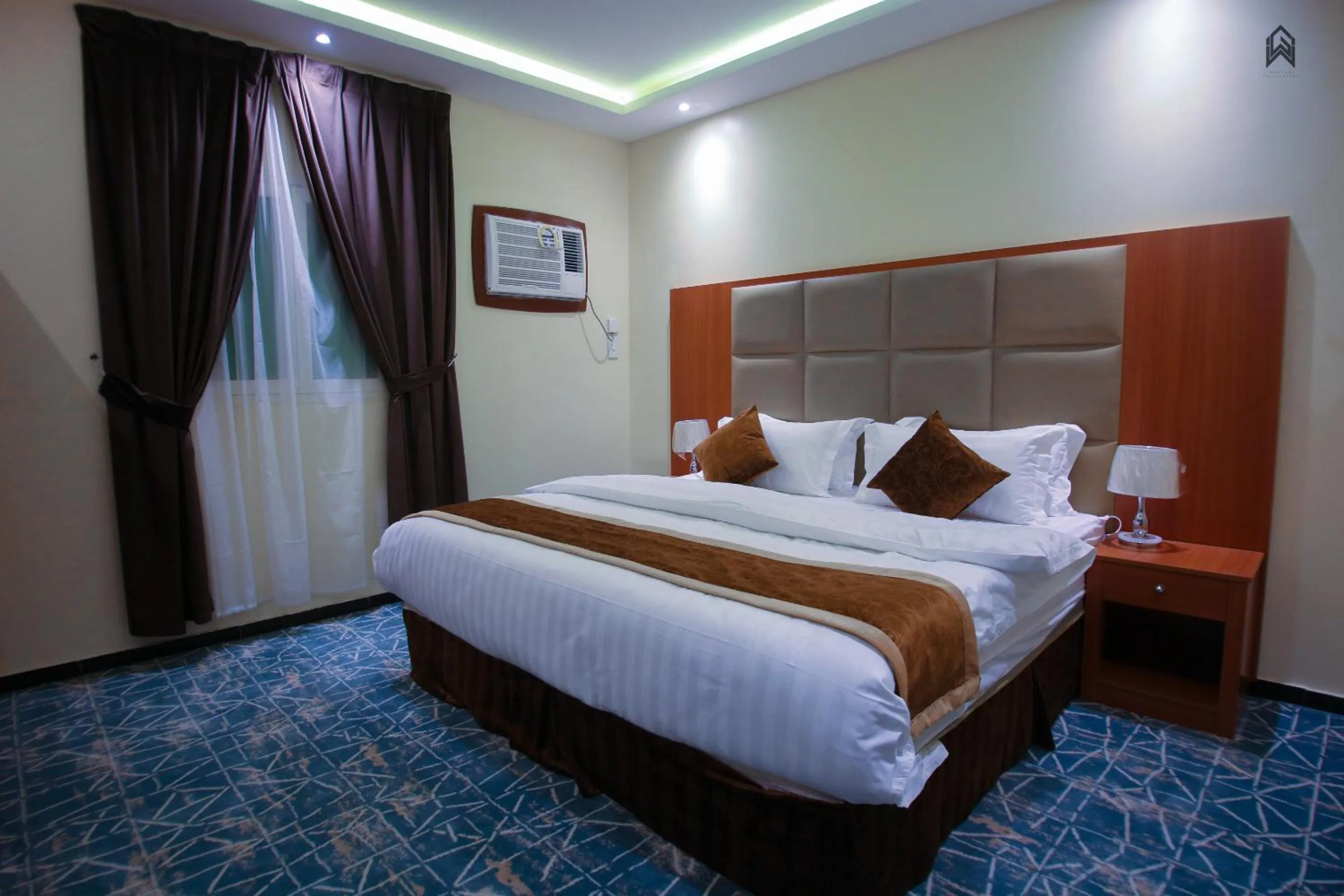 Bedroom, Bed in Loluat Al Matar Furnished Units