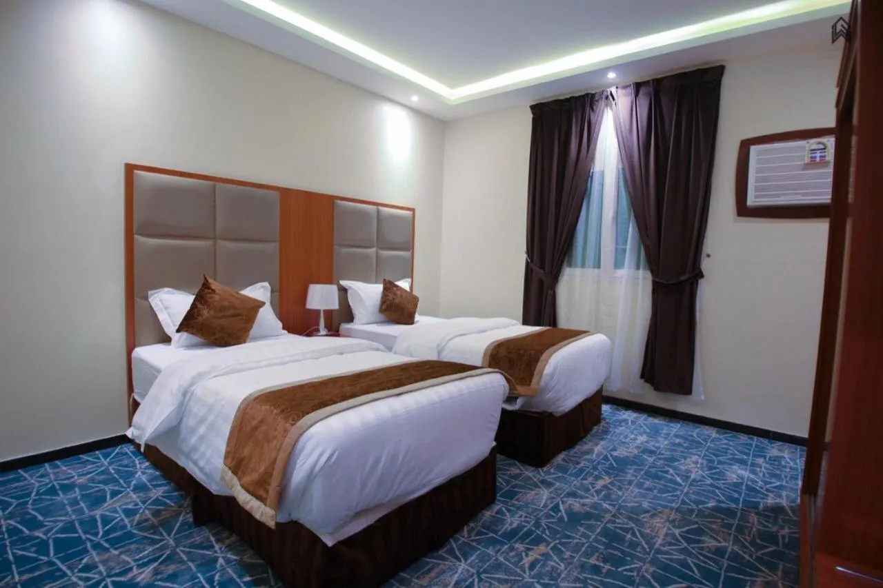 Bedroom, Bed in Loluat Al Matar Furnished Units