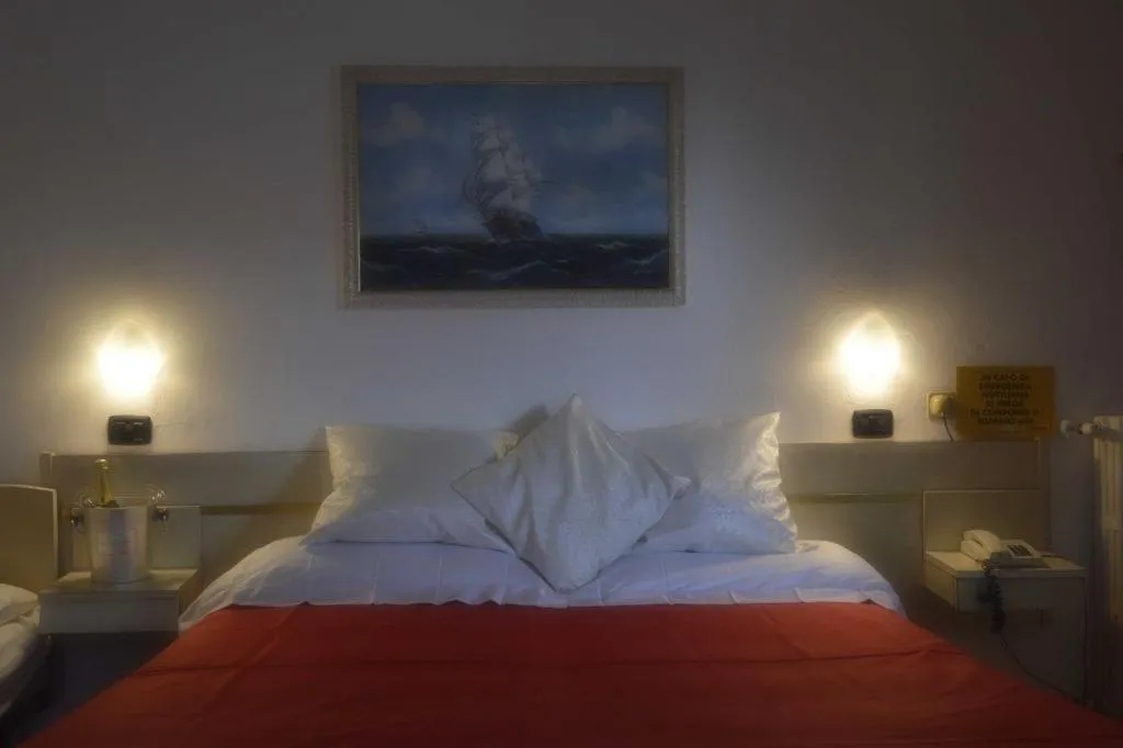 Bed in Dea Della Salute Hotel