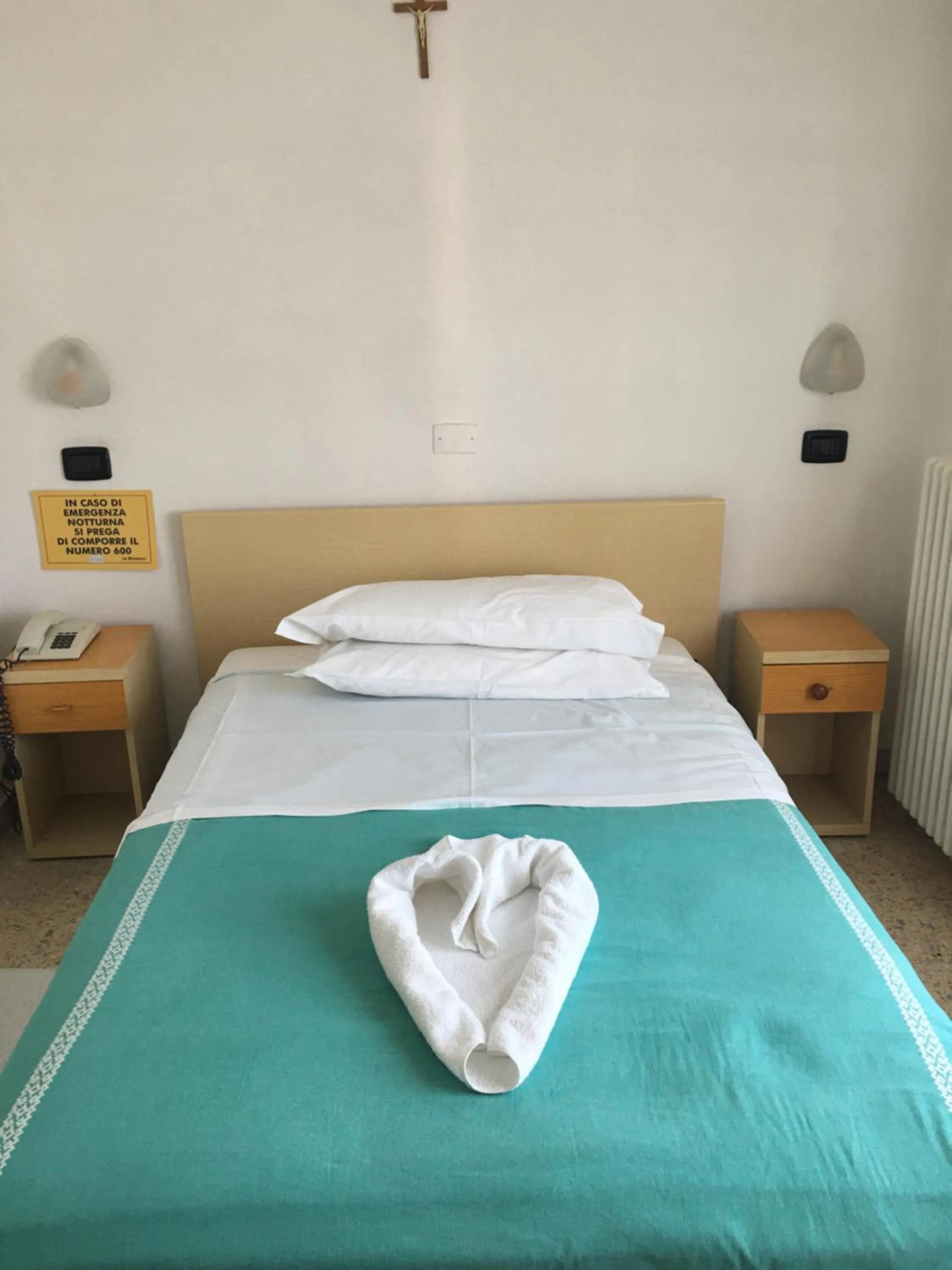 Bed in Dea Della Salute Hotel