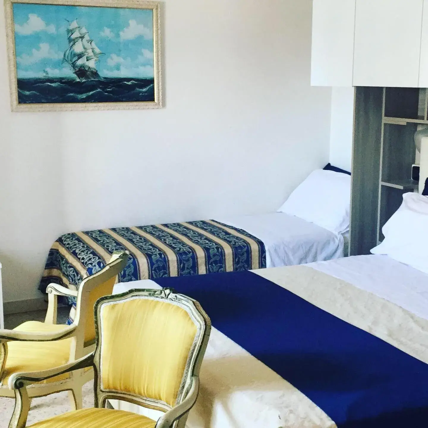 Triple Room in Dea Della Salute Hotel Triple Room in Dea Della Salute Hotel