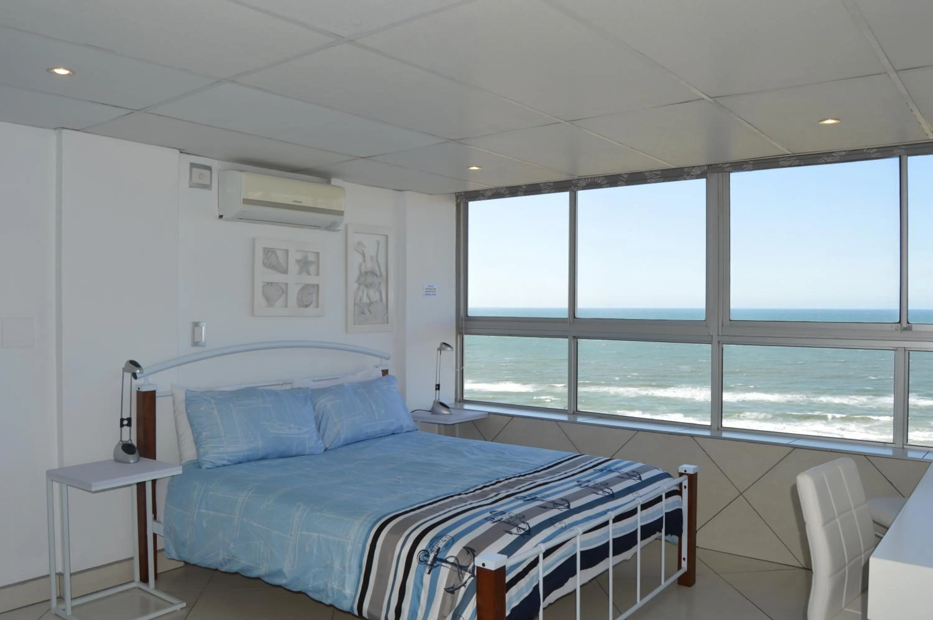 Bedroom, Bed in Accommodation Front - Classy 4 Sleeper with Ocean Views