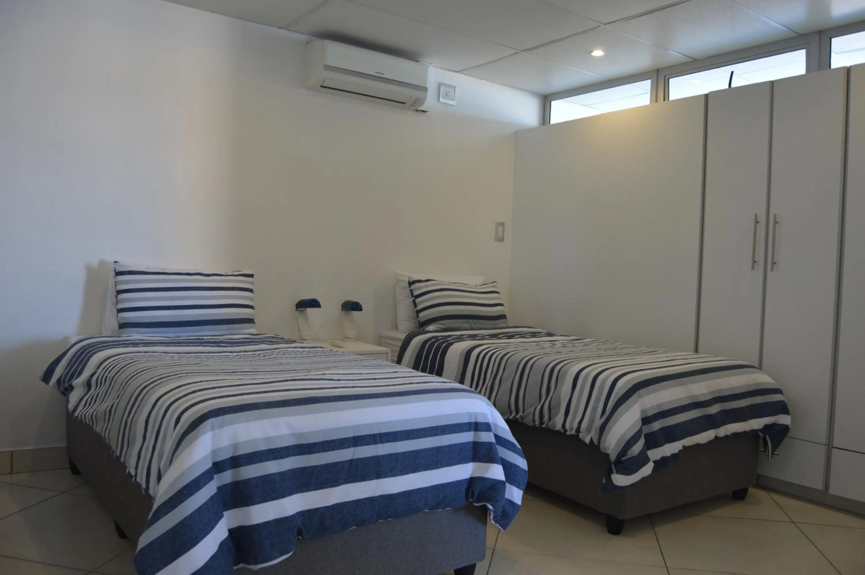 Bedroom, Bed in Accommodation Front - Classy 4 Sleeper with Ocean Views