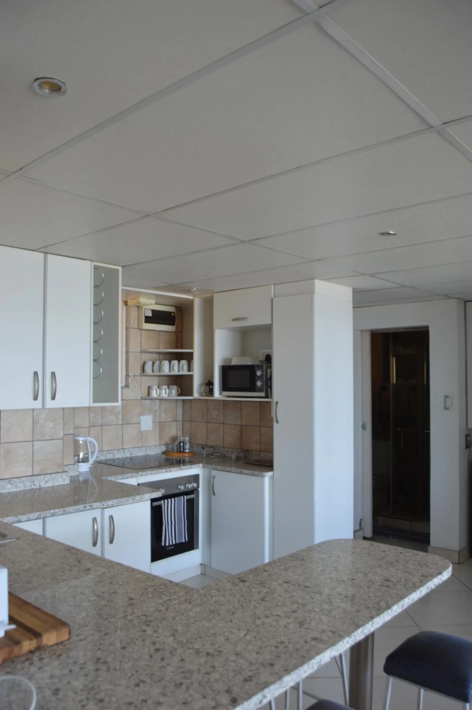 Kitchen or kitchenette in Accommodation Front - Classy 4 Sleeper with Ocean Views