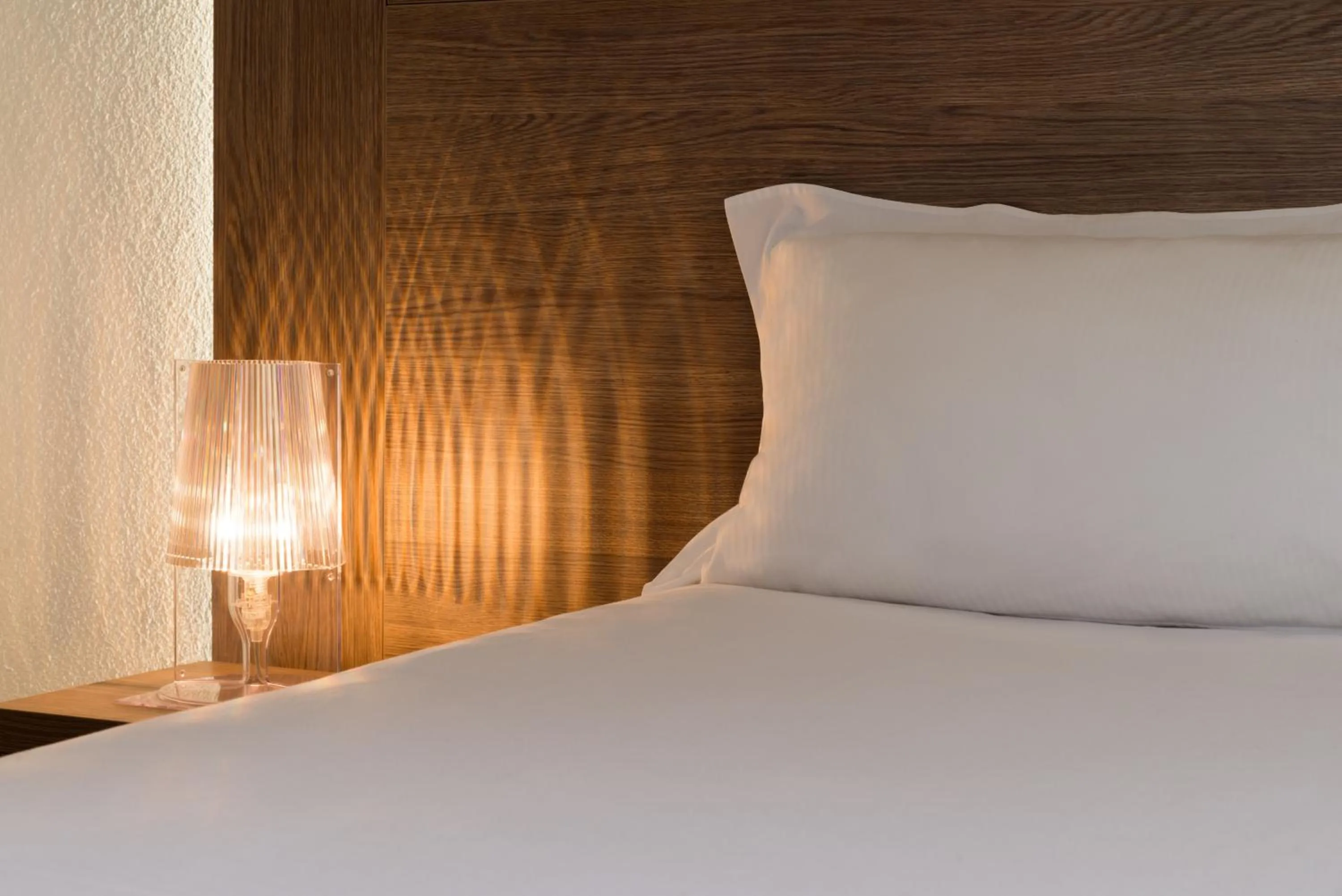 Bed in Hotel Les Amandiers