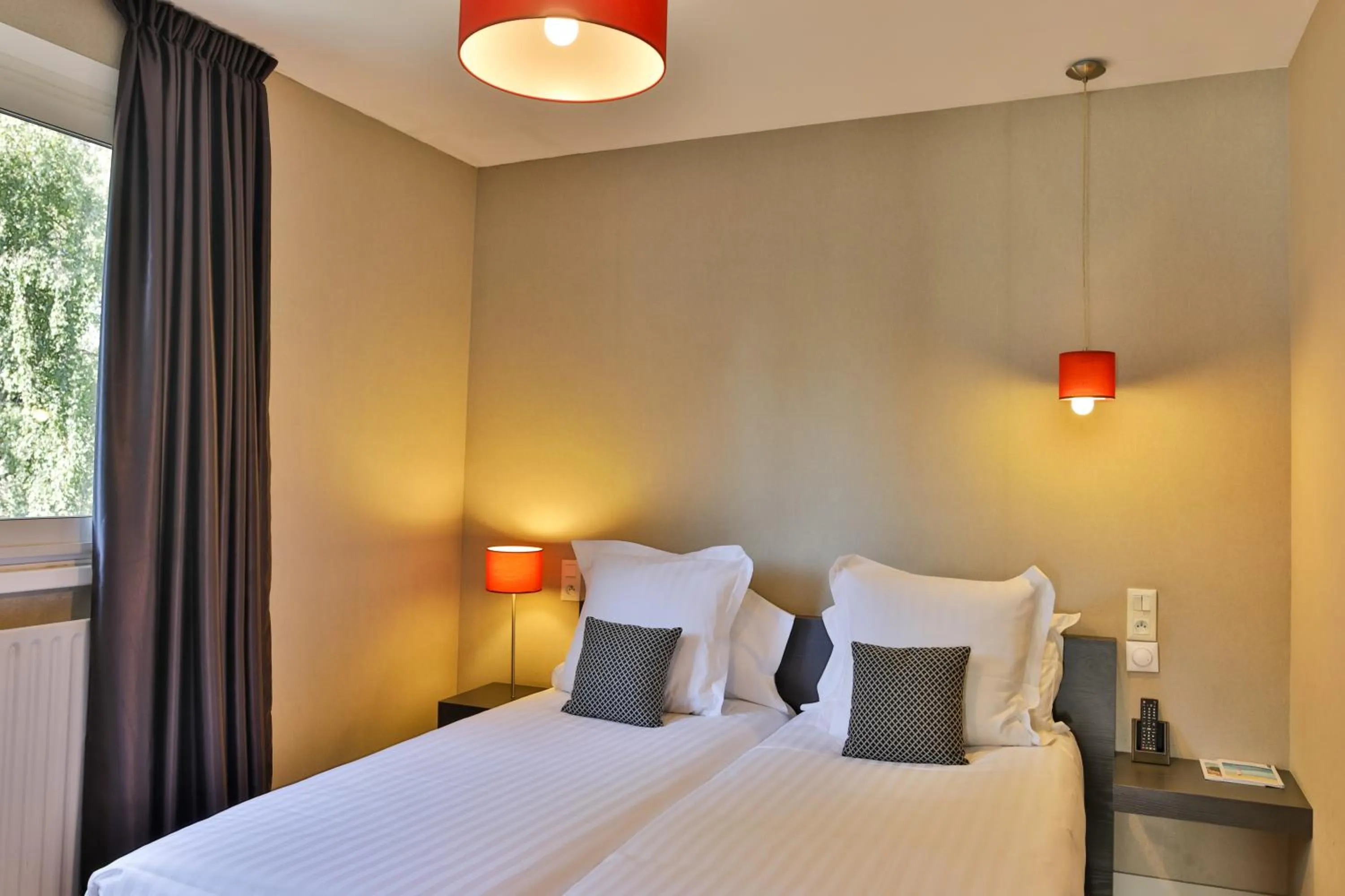 Bed in Le Galet Hotel & Spa