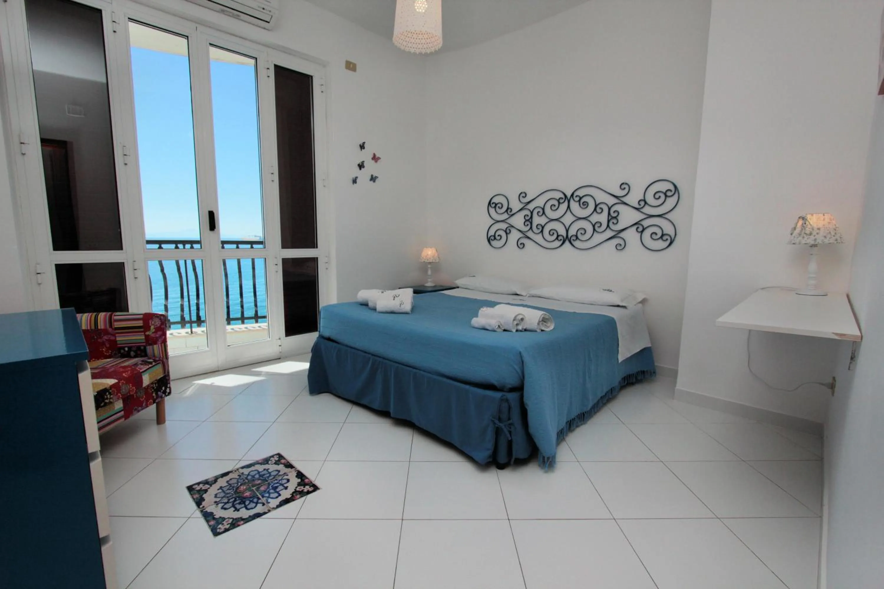 Bed in Due Relais - Panoramic Sea View Suites