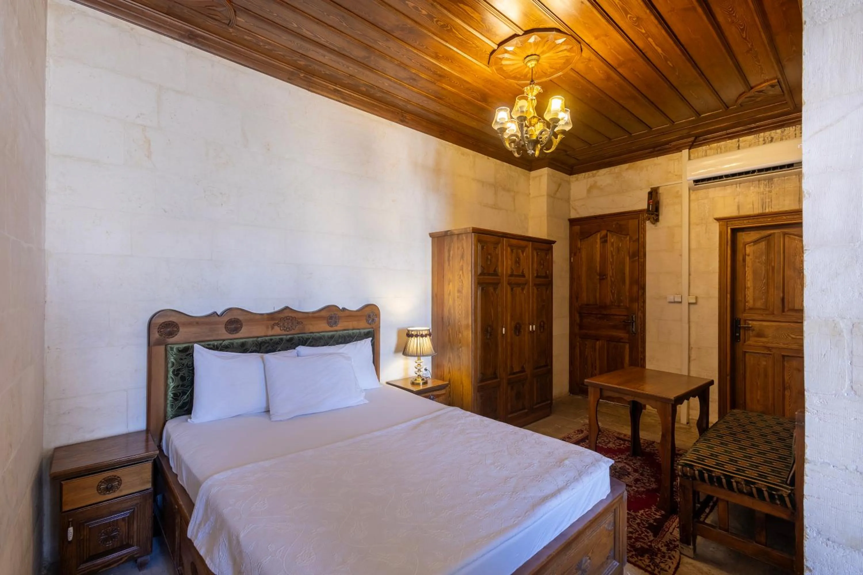 Bed in PALMYRA BOUTIQUE HOTEL