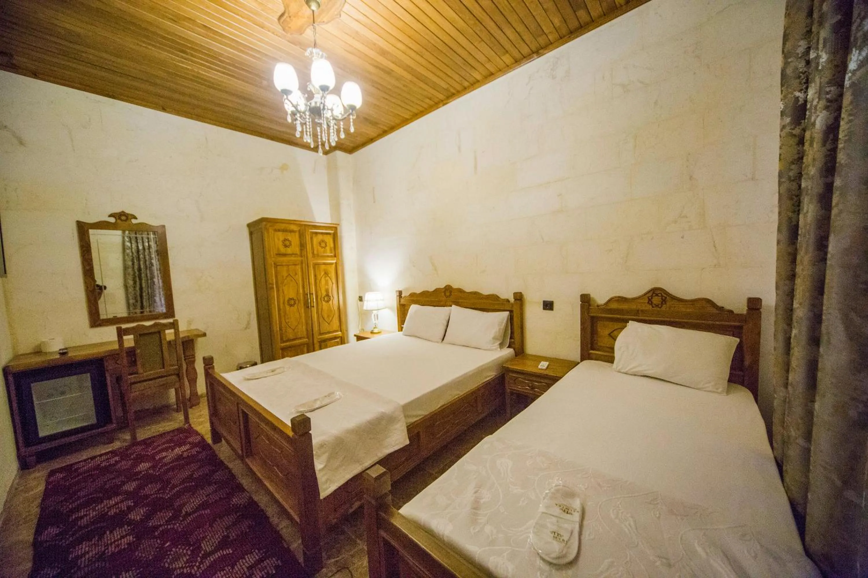 Bed in PALMYRA BOUTIQUE HOTEL