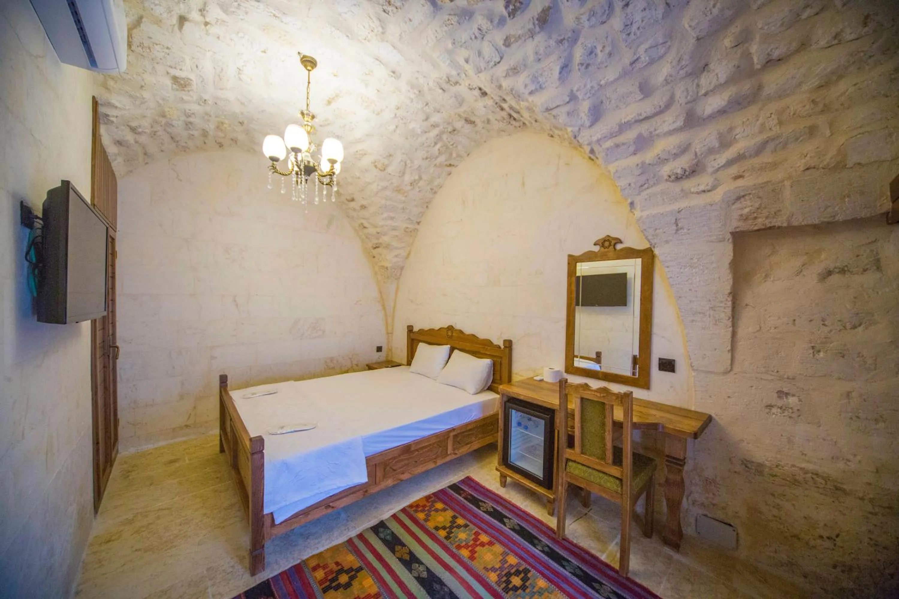 Bed in PALMYRA BOUTIQUE HOTEL