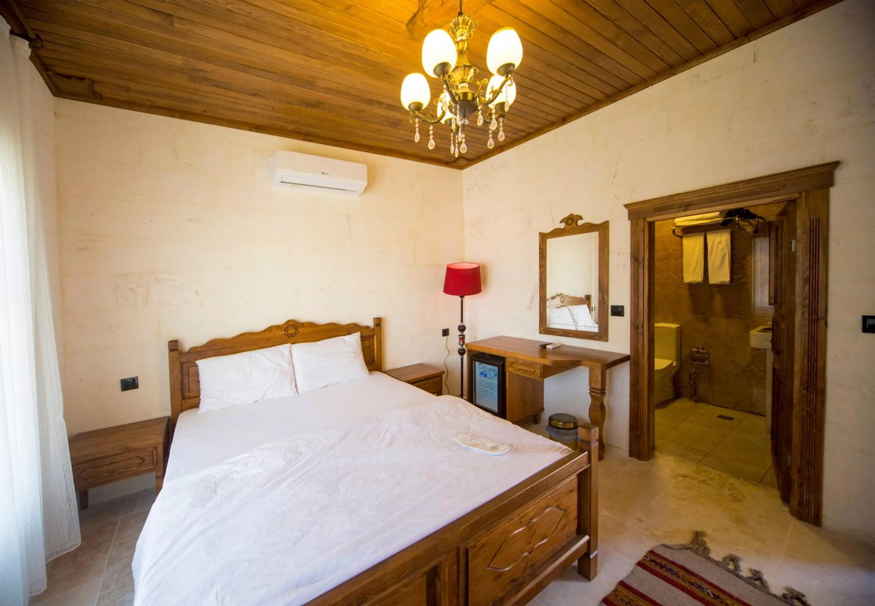 Bed in PALMYRA BOUTIQUE HOTEL