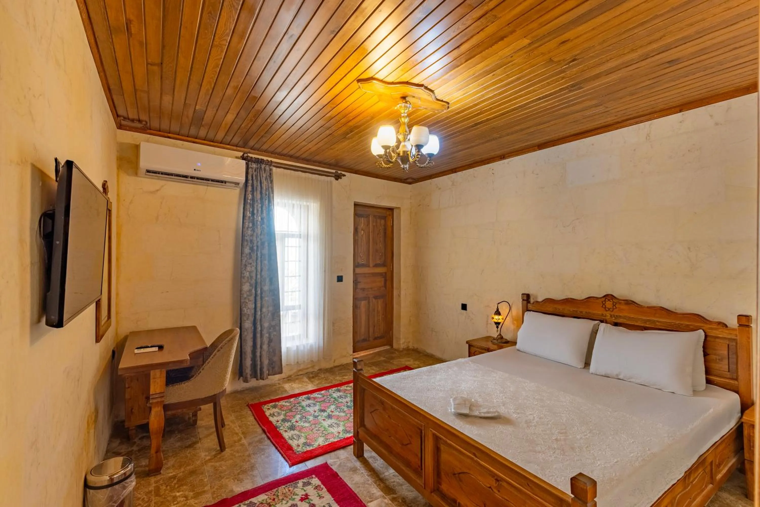 Bed in PALMYRA BOUTIQUE HOTEL