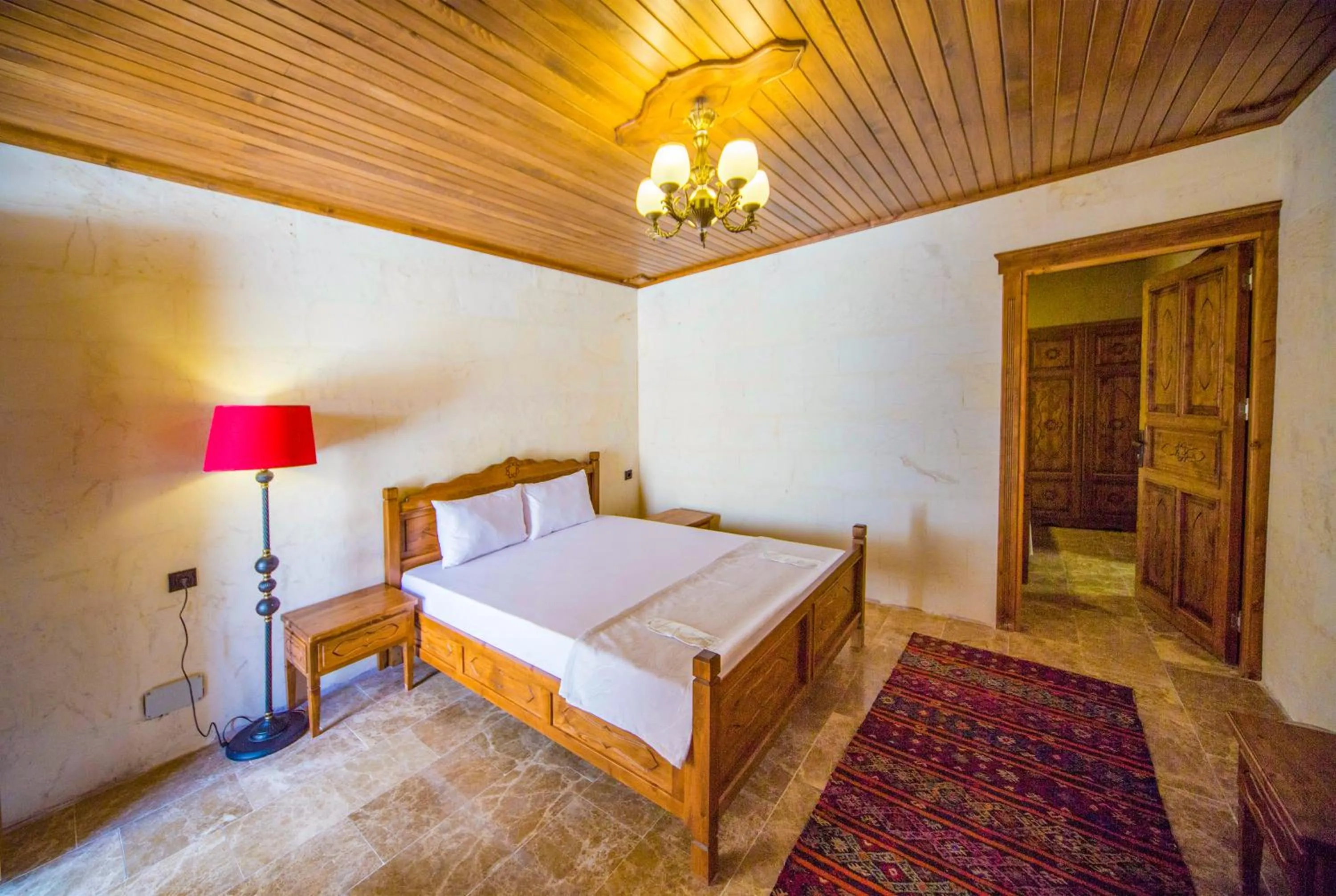 Bed in PALMYRA BOUTIQUE HOTEL