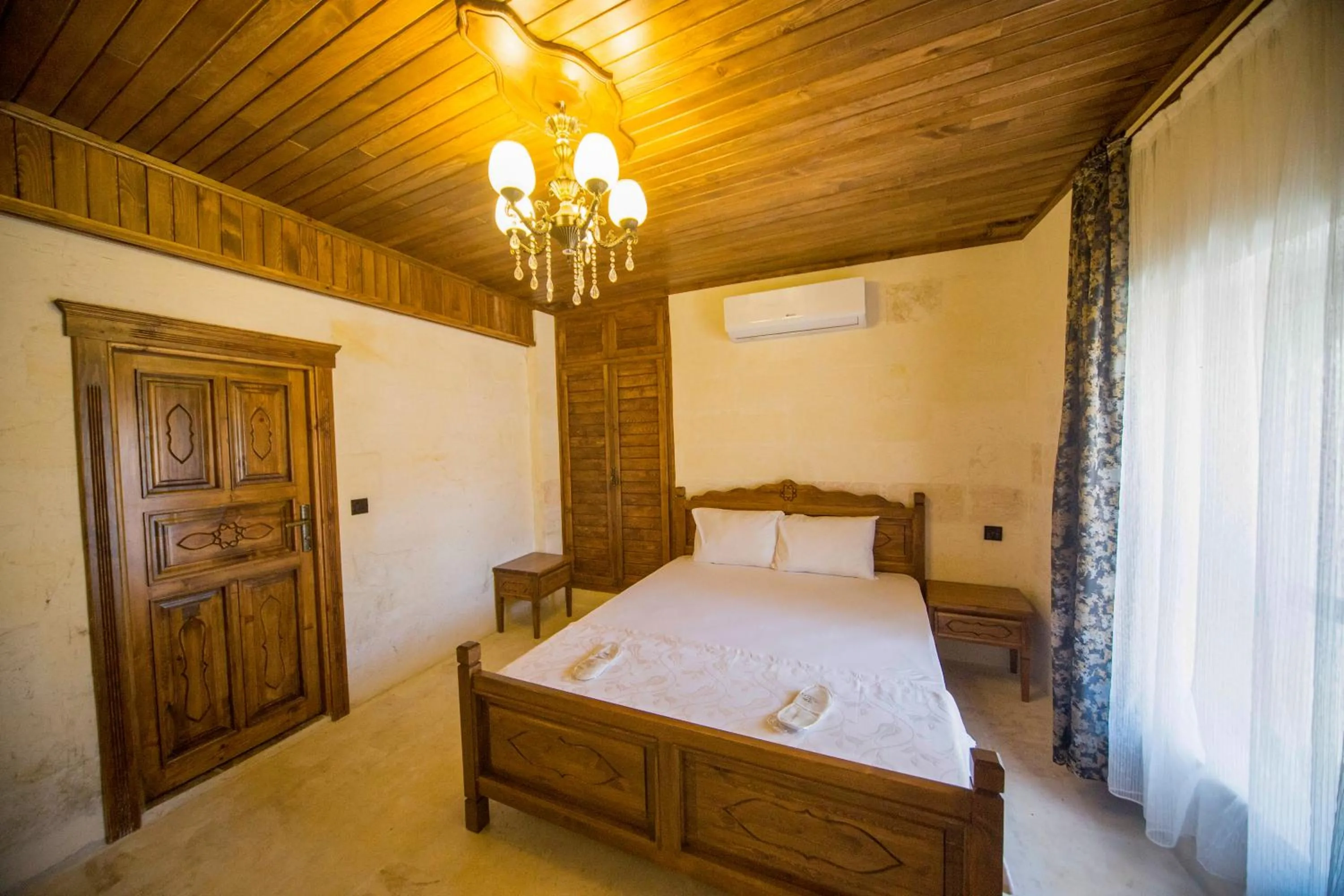 Bed in PALMYRA BOUTIQUE HOTEL