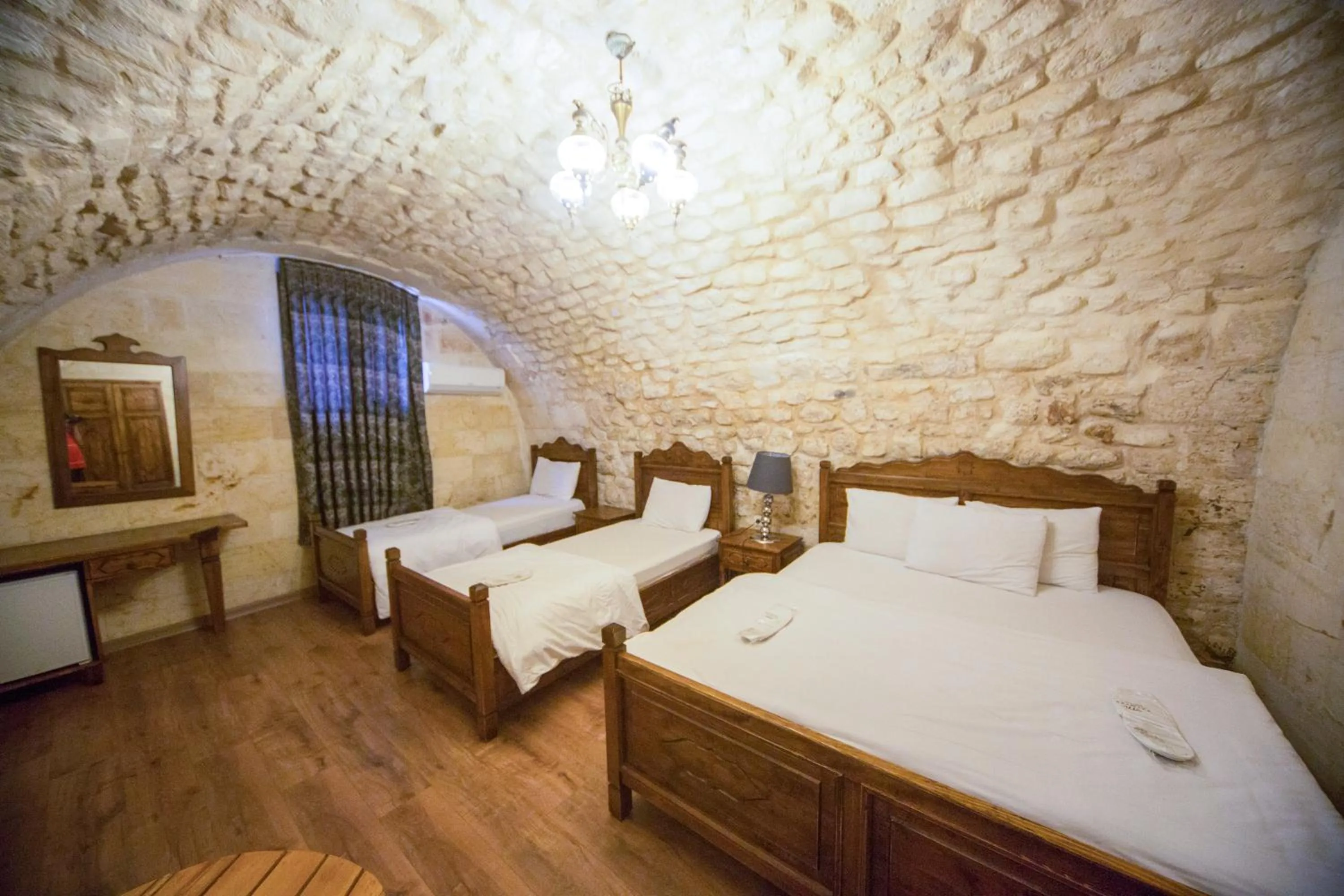 Bed in PALMYRA BOUTIQUE HOTEL