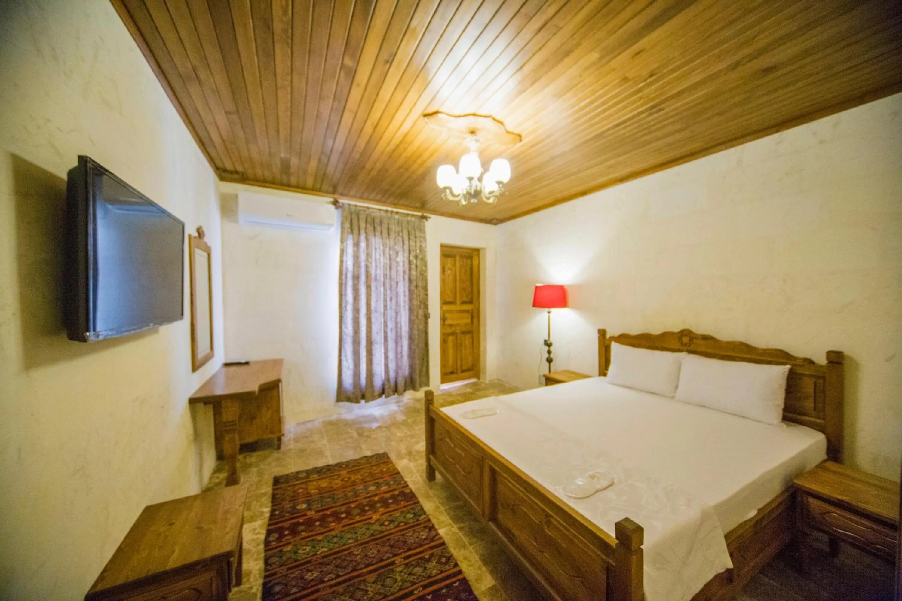 Bed in PALMYRA BOUTIQUE HOTEL