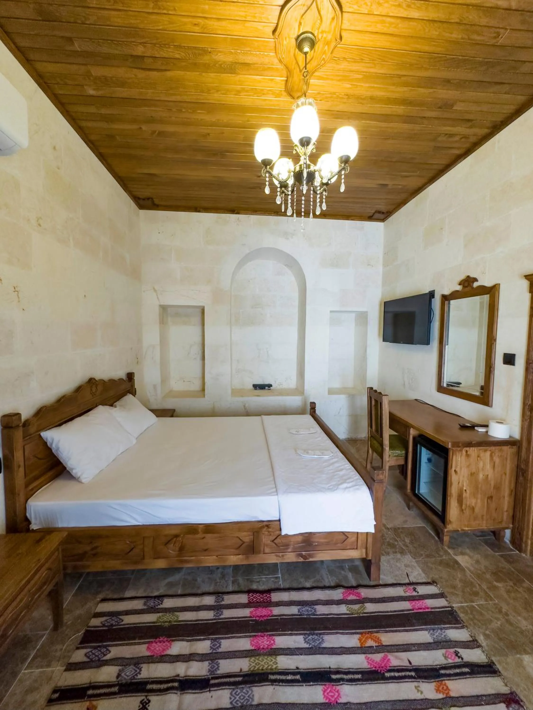 Bed in PALMYRA BOUTIQUE HOTEL