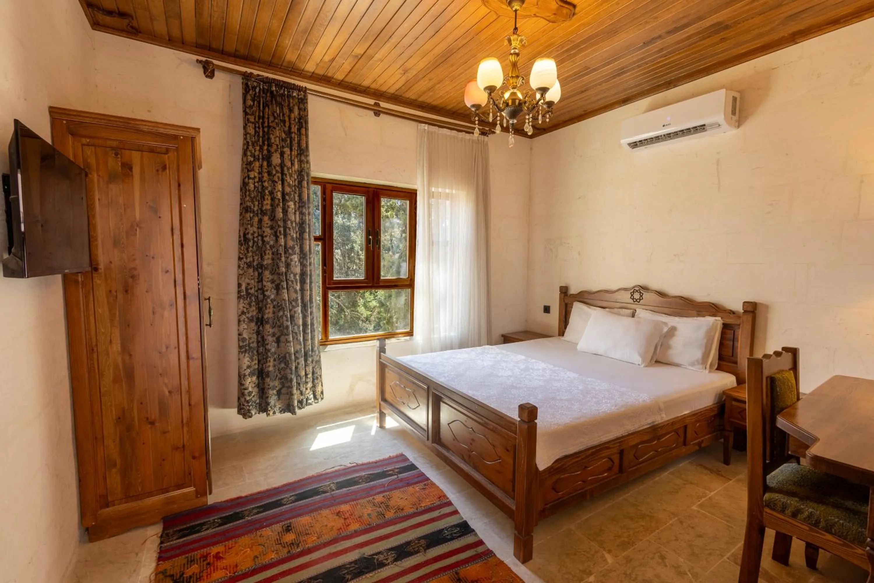 Bed in PALMYRA BOUTIQUE HOTEL