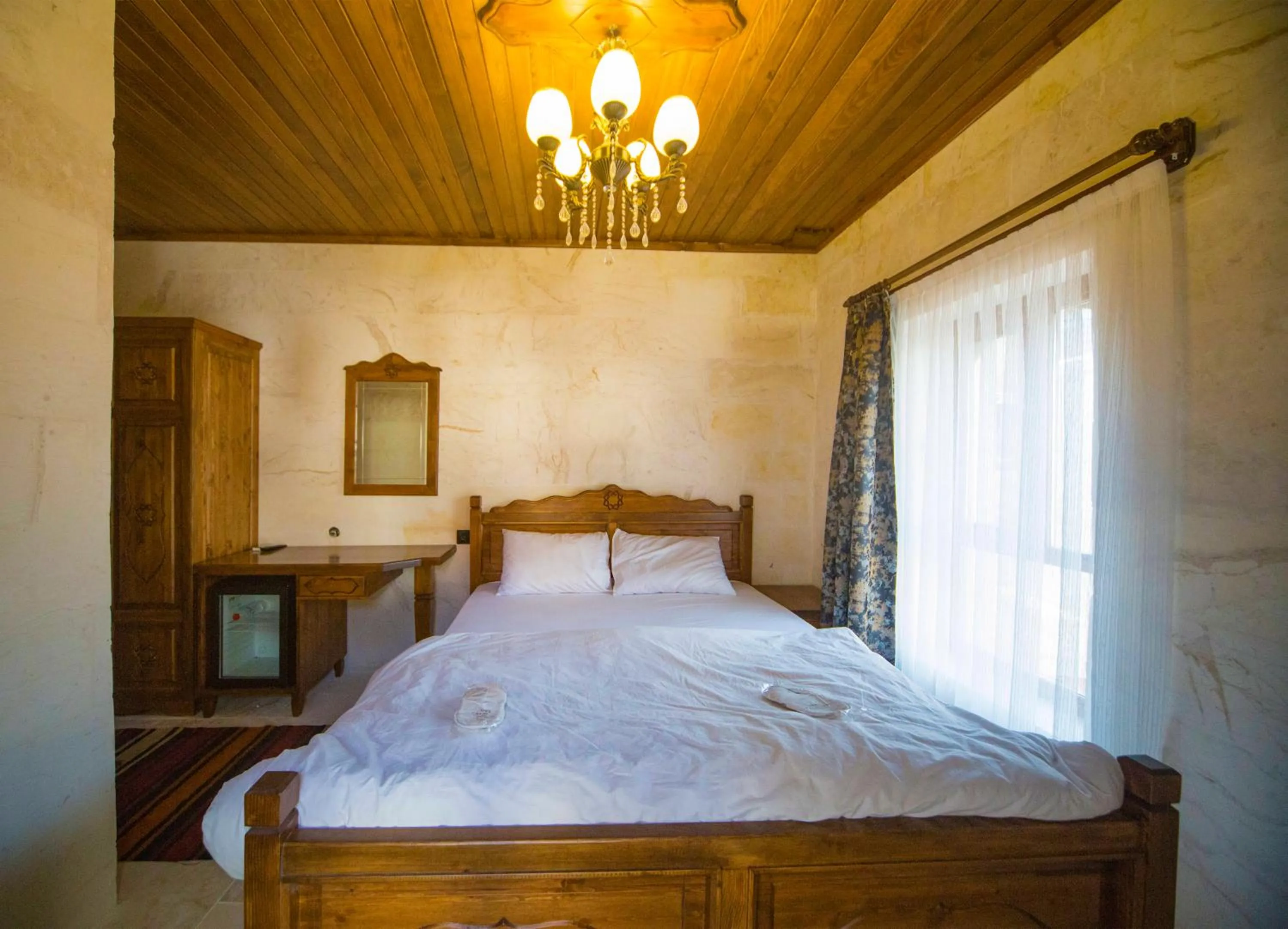 Bed in PALMYRA BOUTIQUE HOTEL