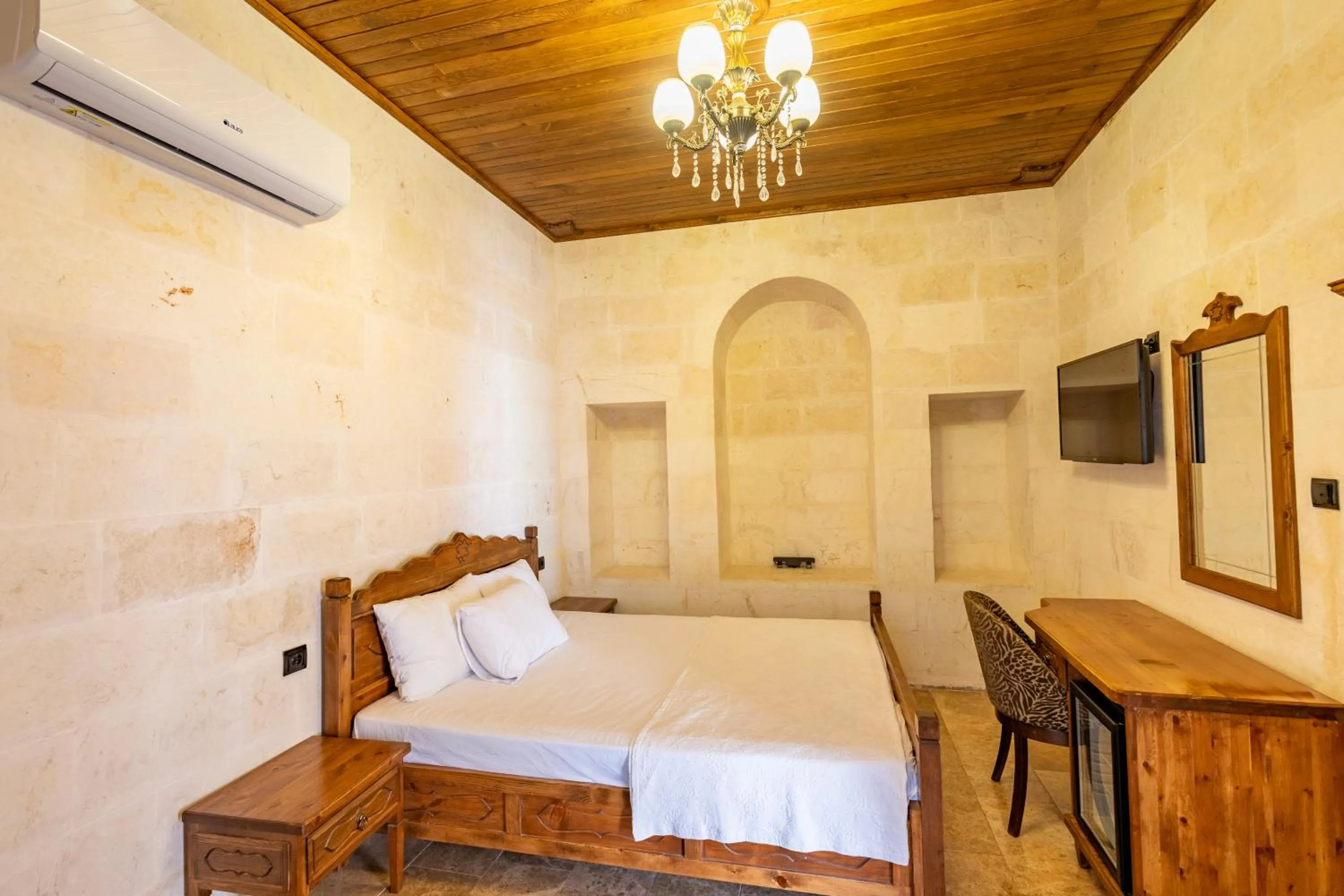 Bed in PALMYRA BOUTIQUE HOTEL