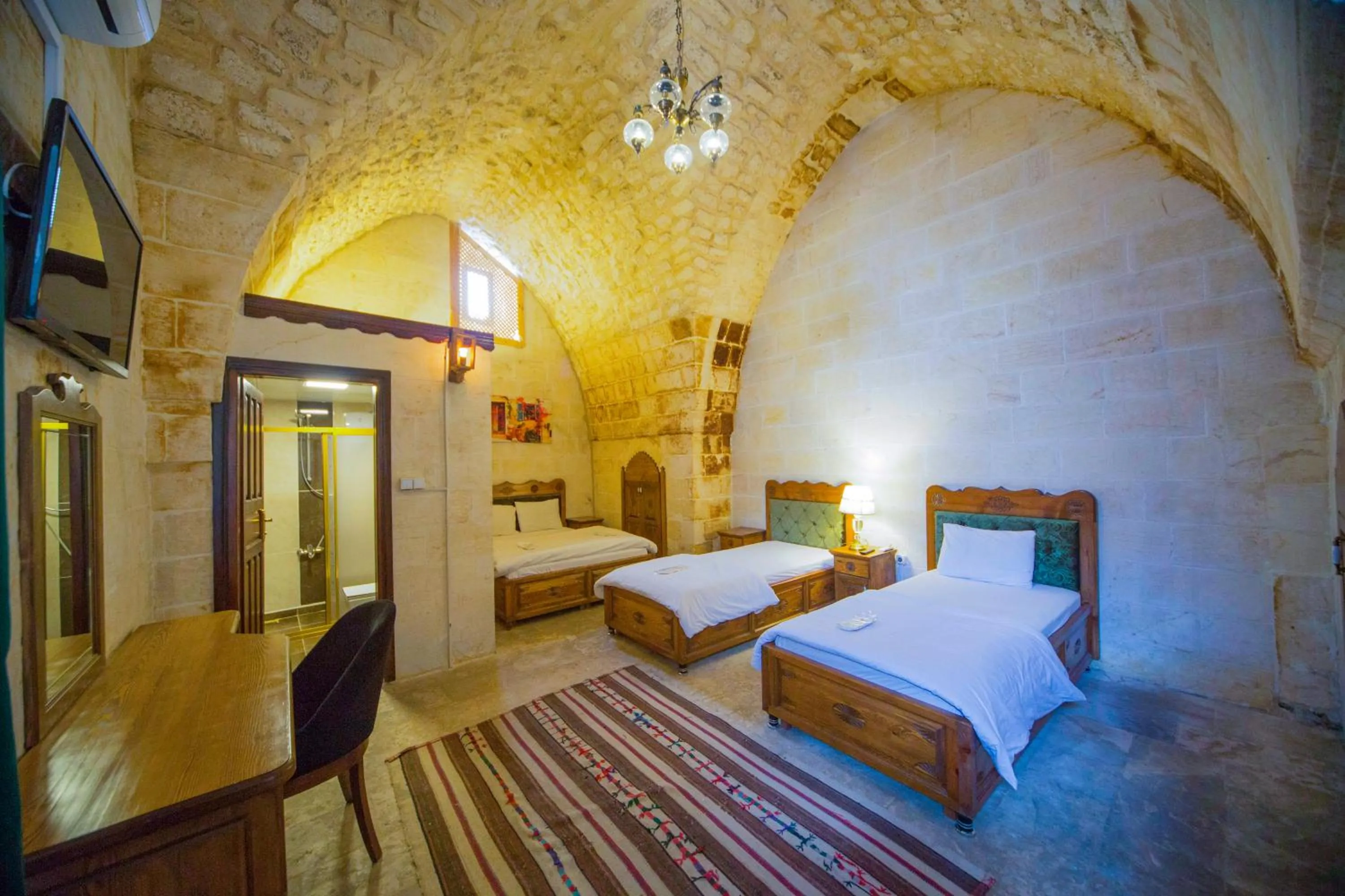 Bed in PALMYRA BOUTIQUE HOTEL