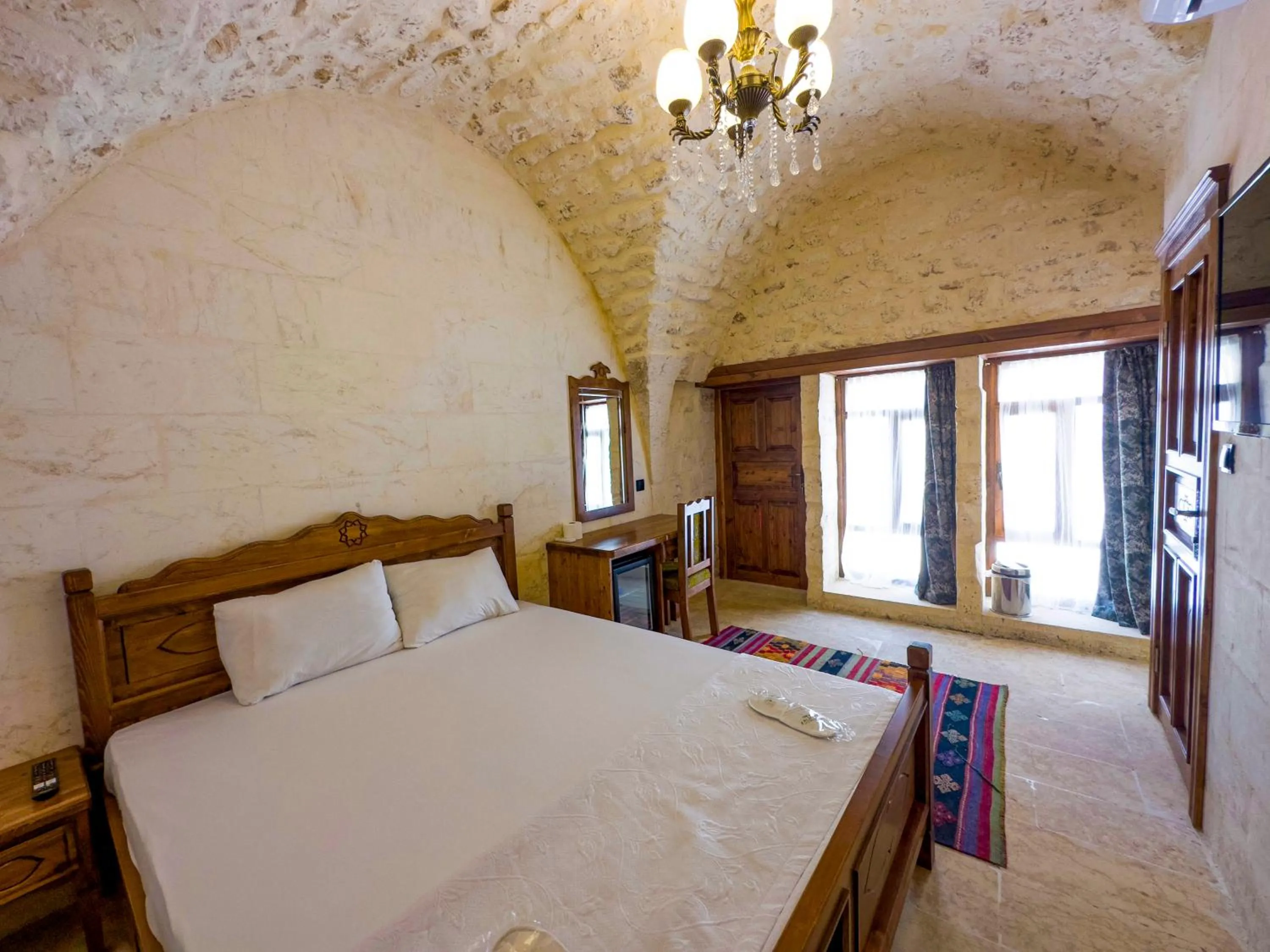 Bed in PALMYRA BOUTIQUE HOTEL