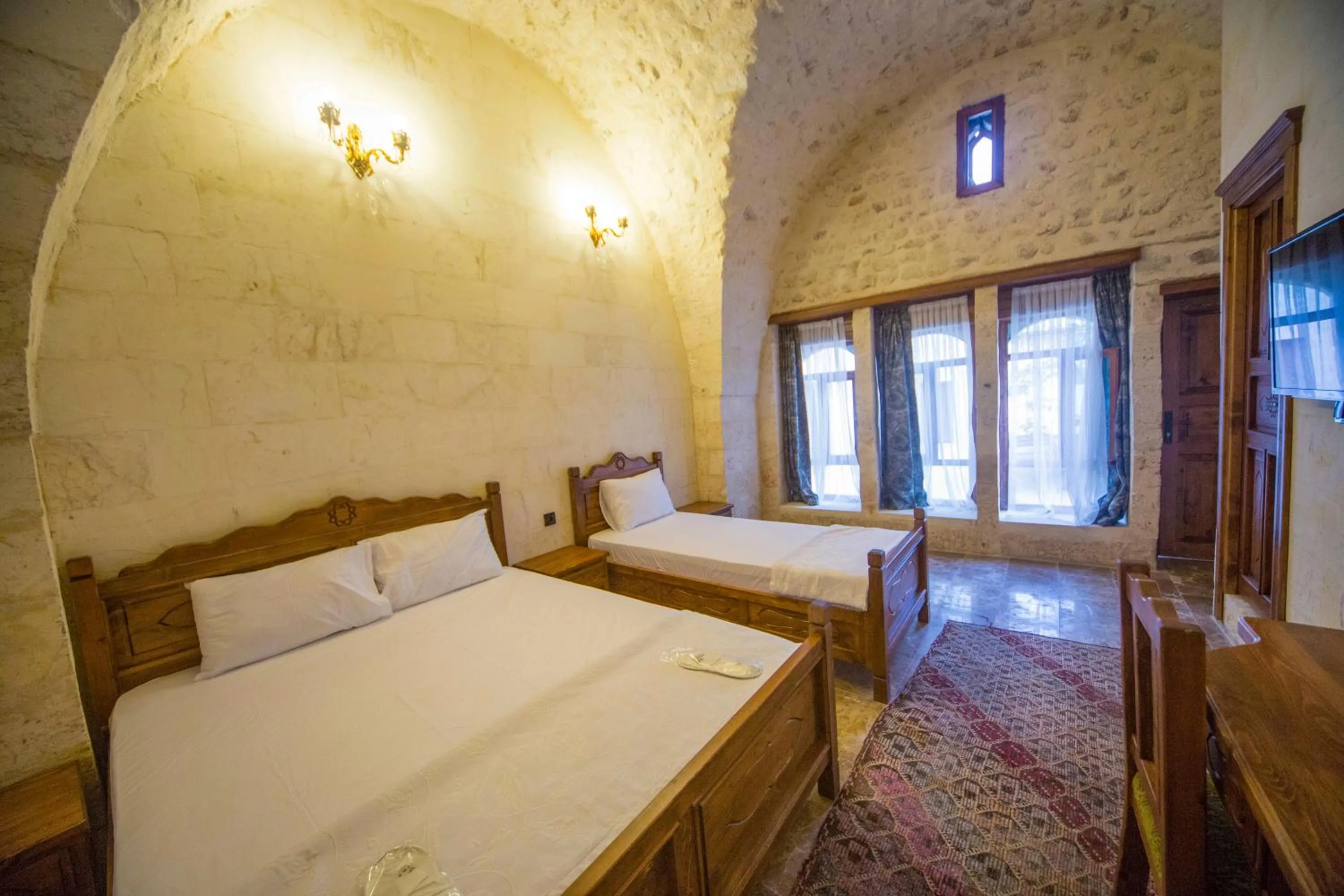 Bed in PALMYRA BOUTIQUE HOTEL