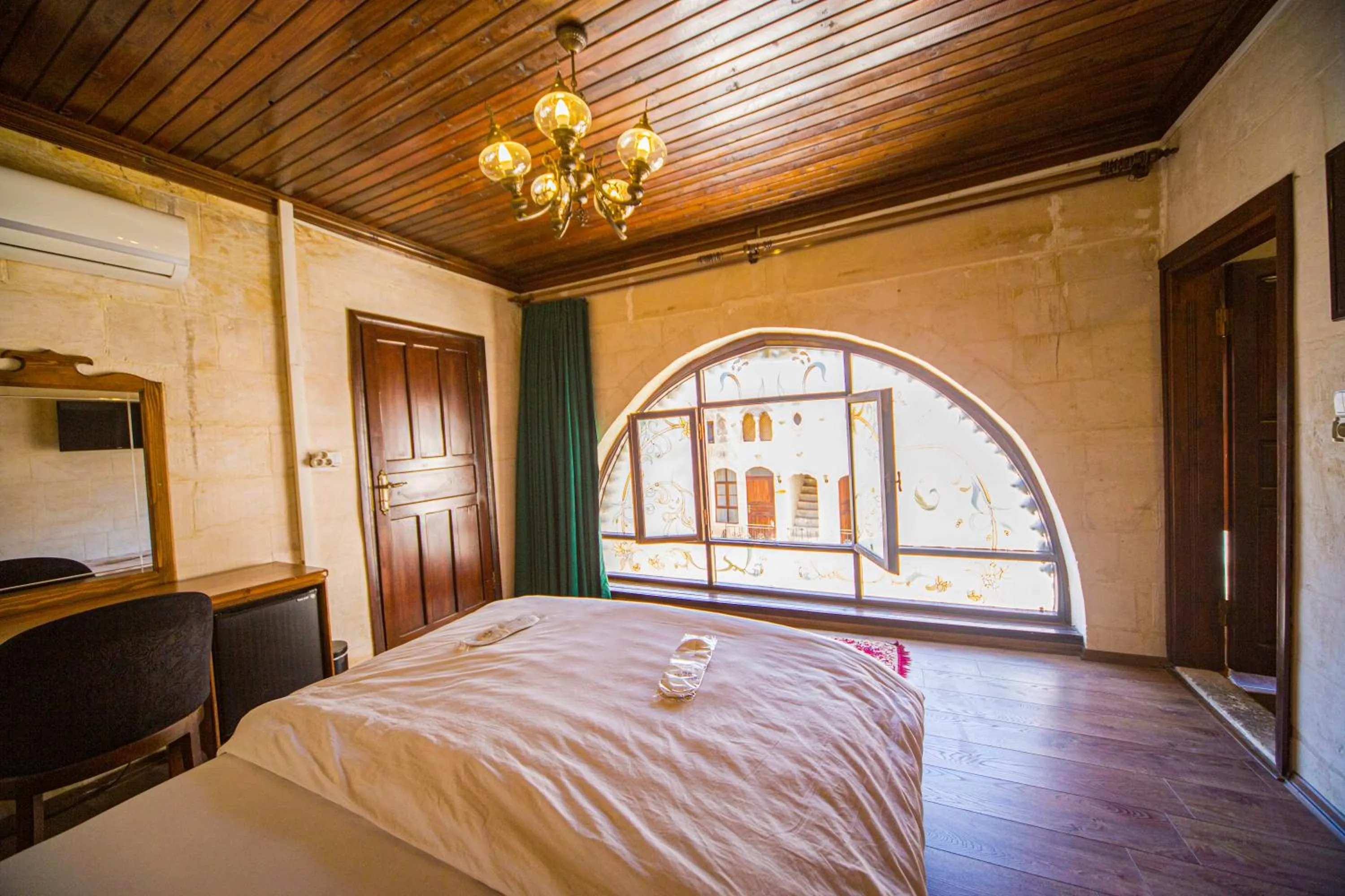 Bed in PALMYRA BOUTIQUE HOTEL