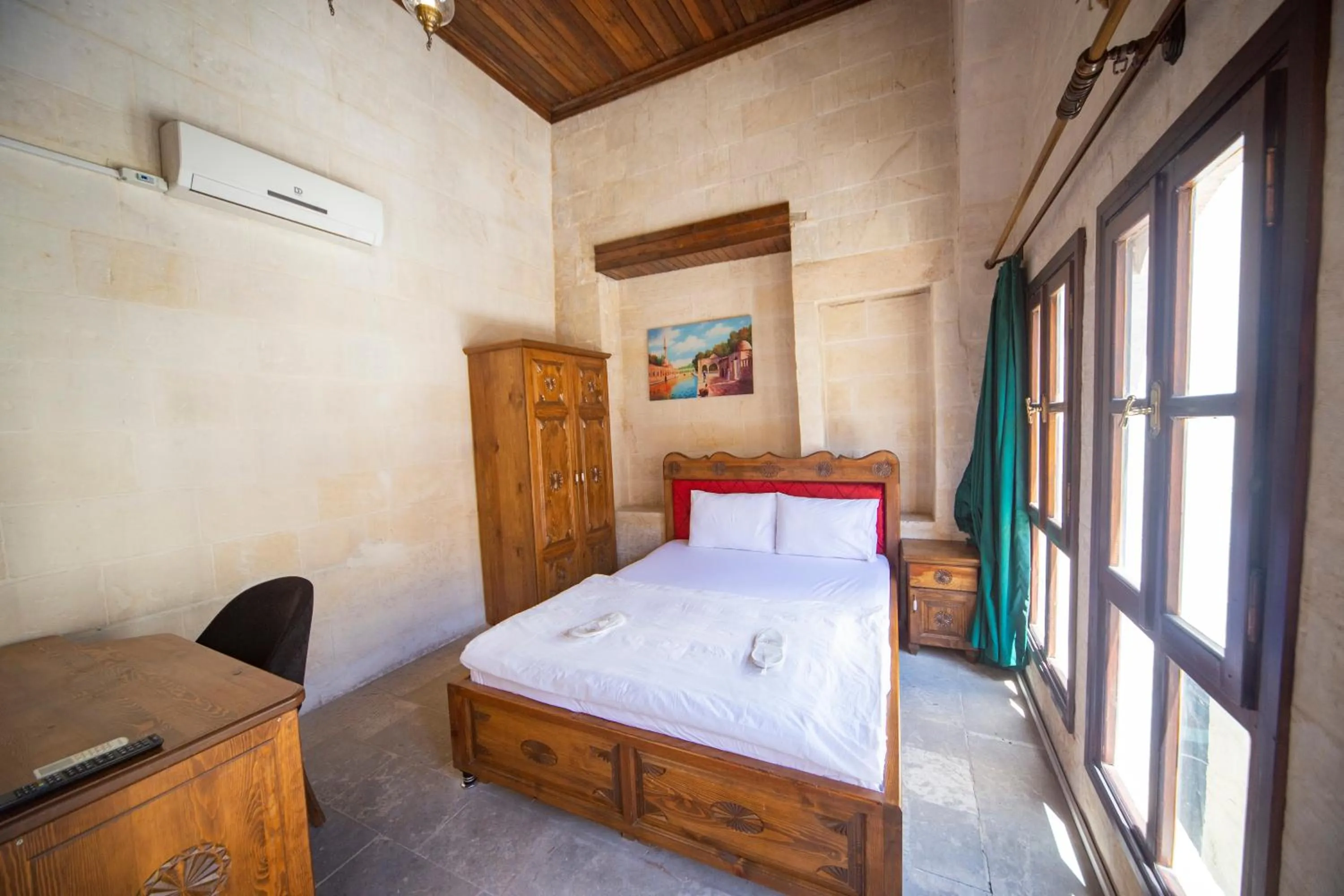 Bed in PALMYRA BOUTIQUE HOTEL