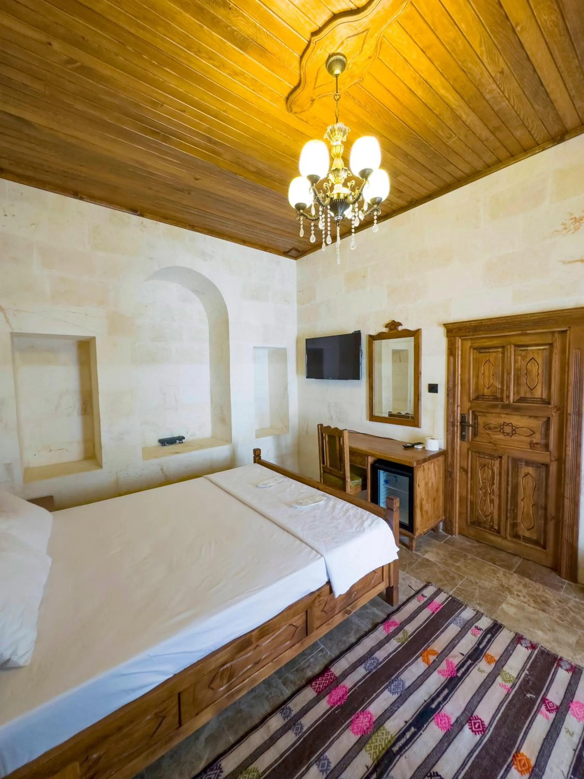 Bed in PALMYRA BOUTIQUE HOTEL