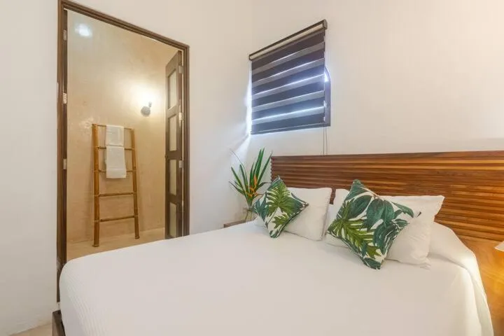 Bed in Villas El Encanto Cozumel