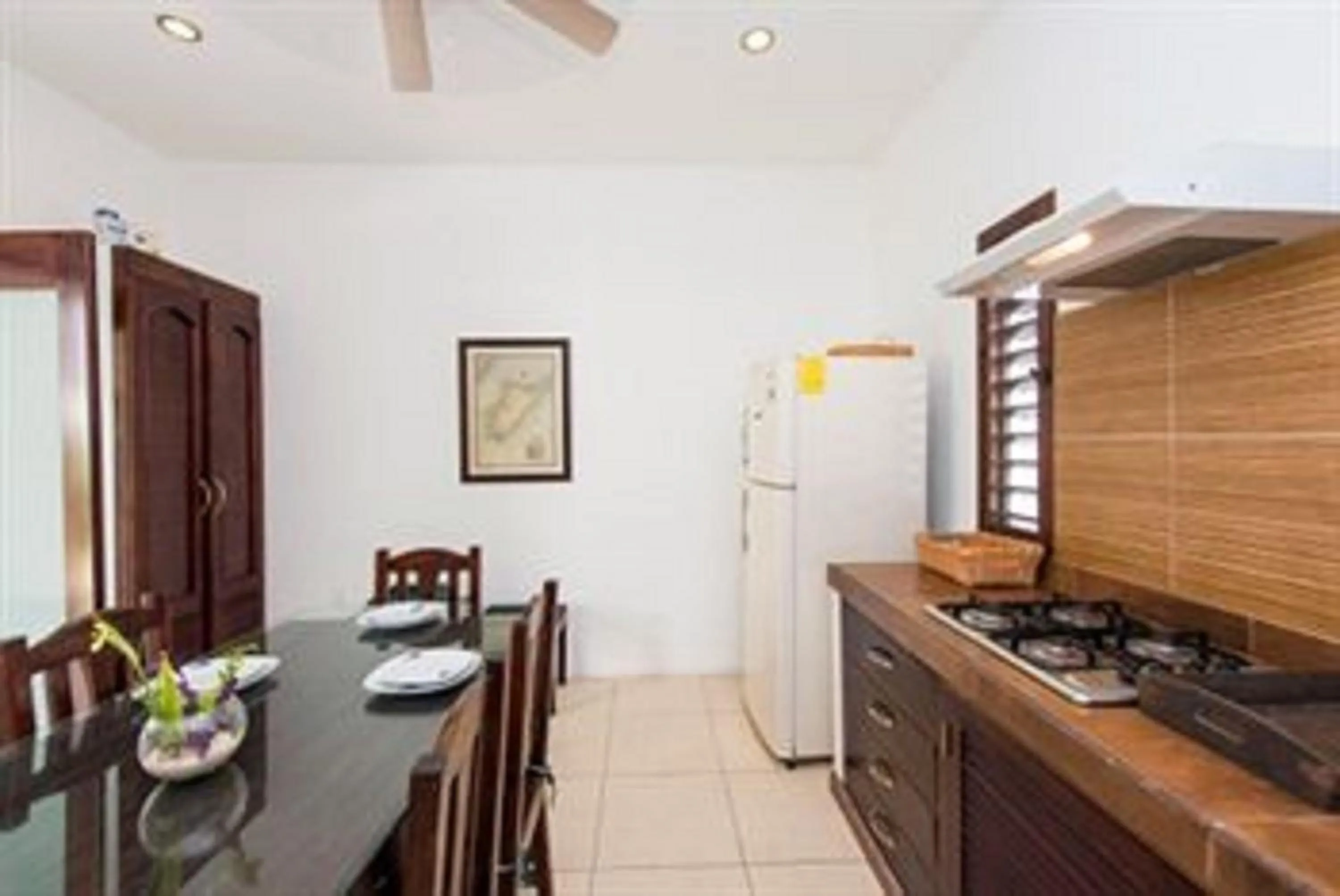 Kitchen or kitchenette in Villas El Encanto Cozumel