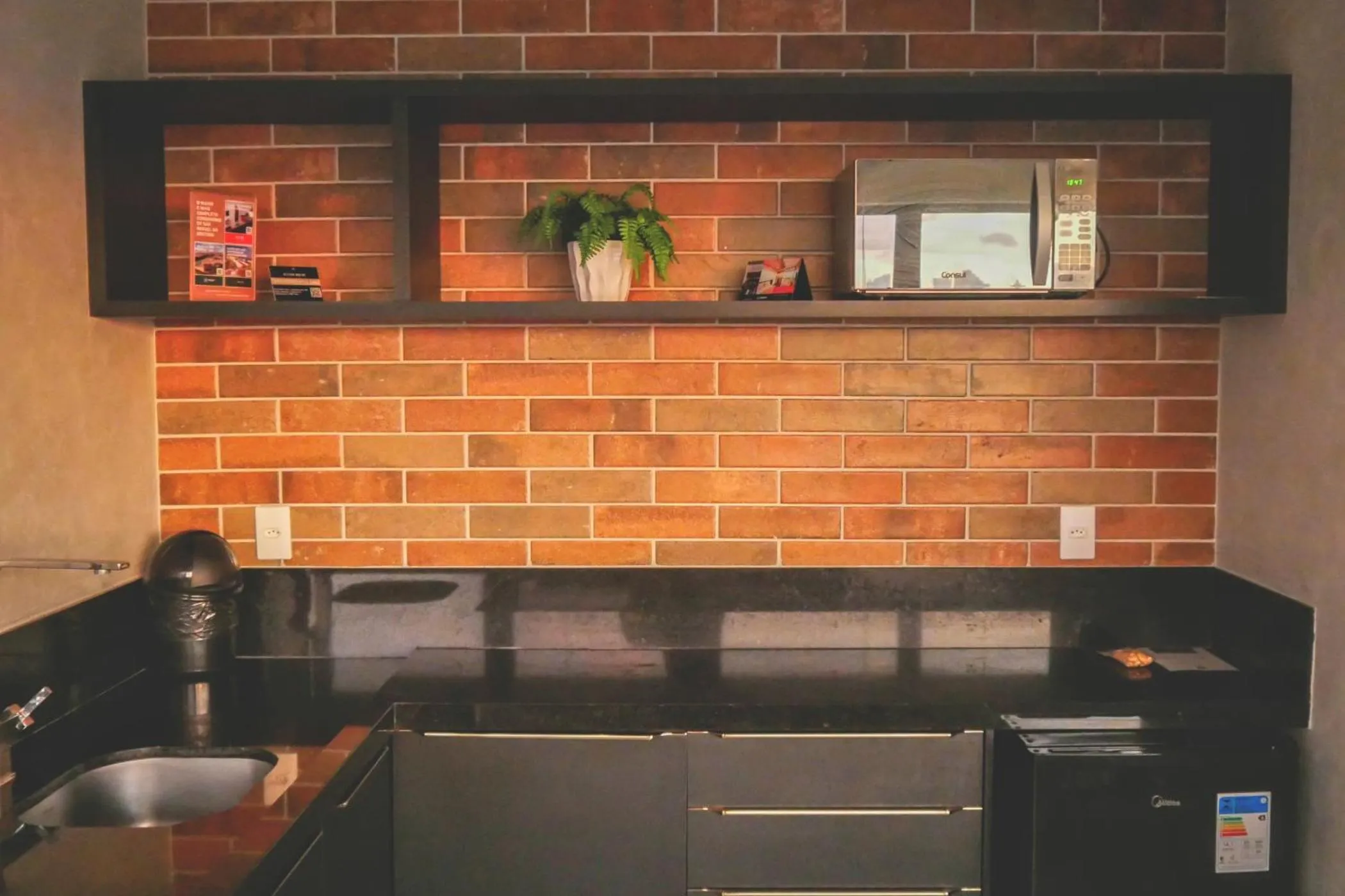 kitchen in Reserva Madero Loft Natal Hotel