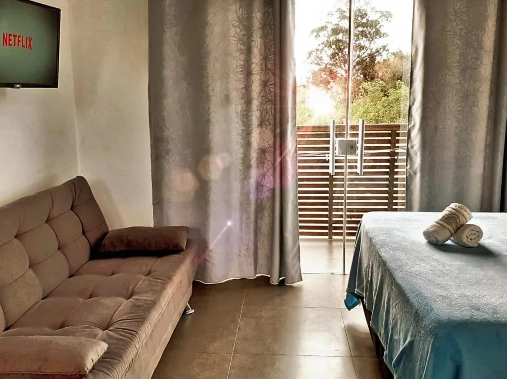 Bed in Pousada Suítes do Rosa