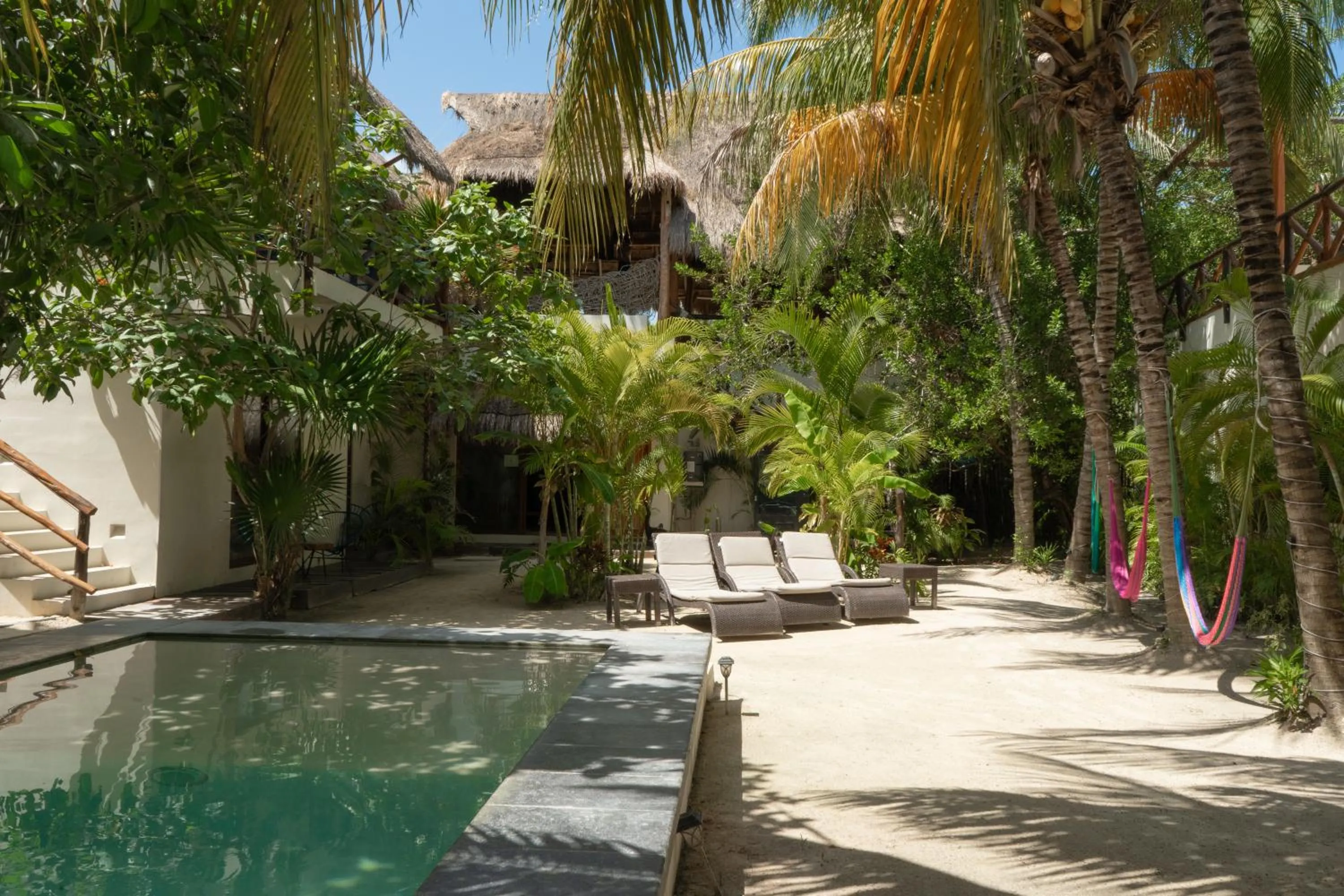 Swimming pool in Hotel Boutique La Puerta Azul Beachfront - Adults Only