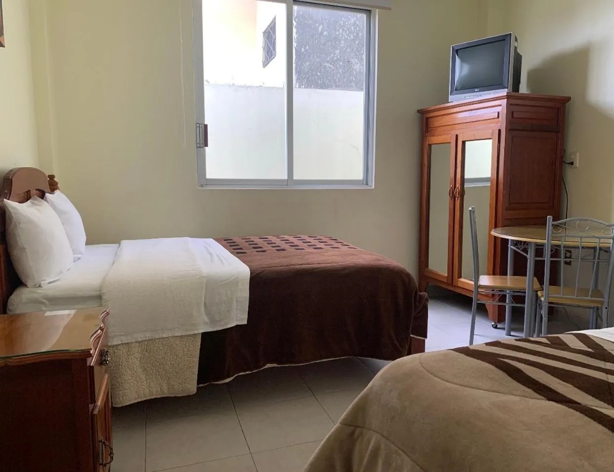 Bed in Hotel Renacimiento