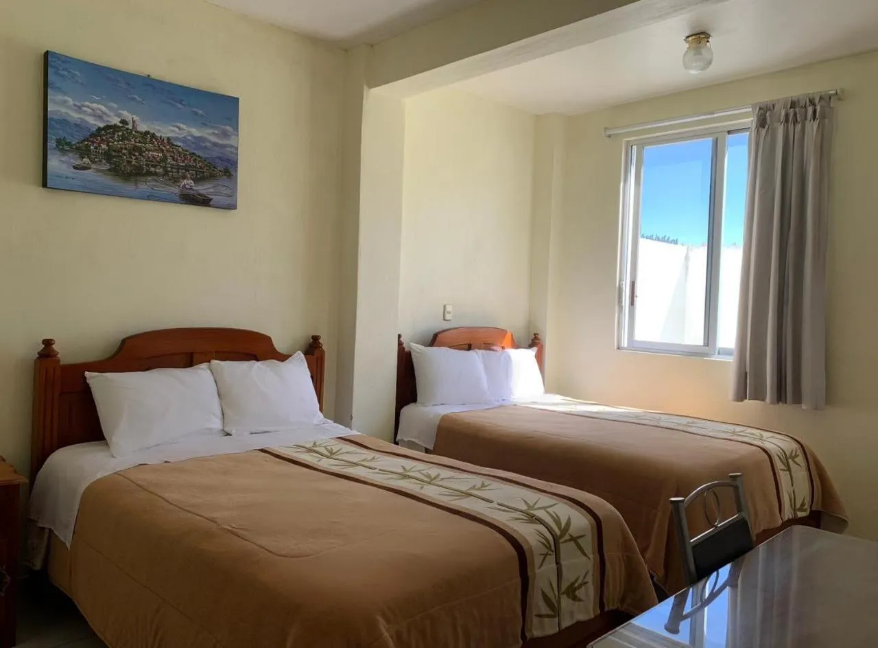 Bed in Hotel Renacimiento