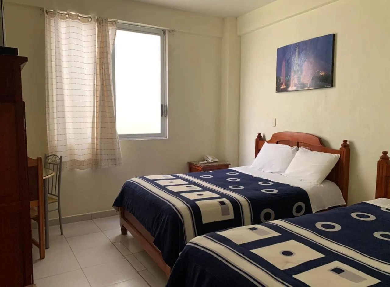 Bed in Hotel Renacimiento