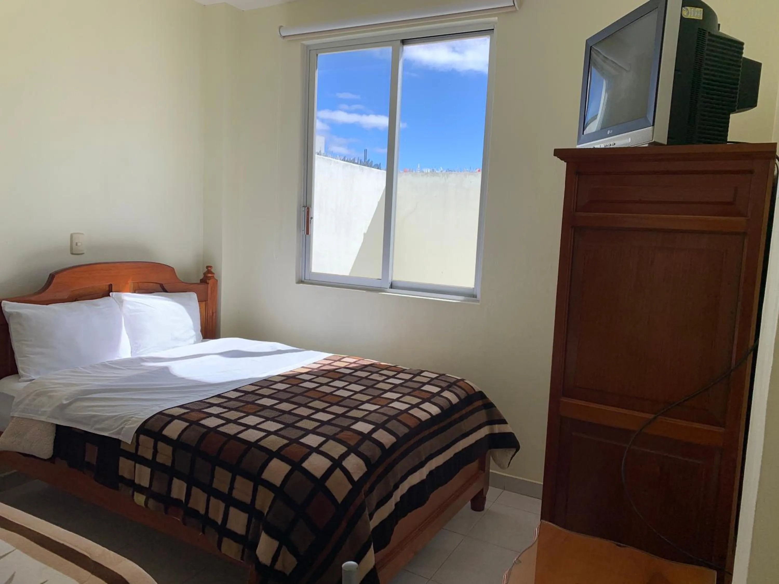 Bed in Hotel Renacimiento