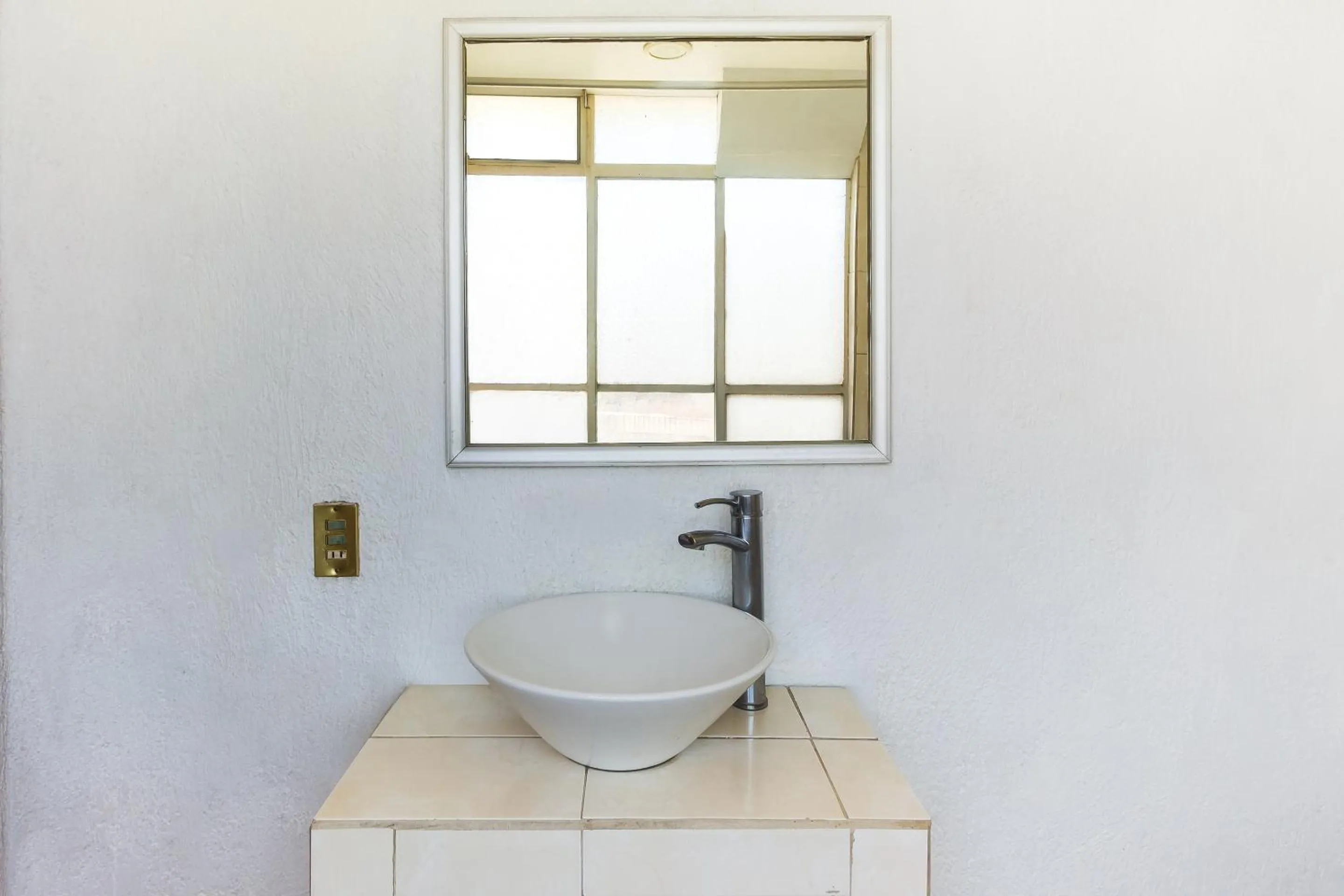 Bathroom in Capital O Nueva Galicia, Guadalajara centro downtown