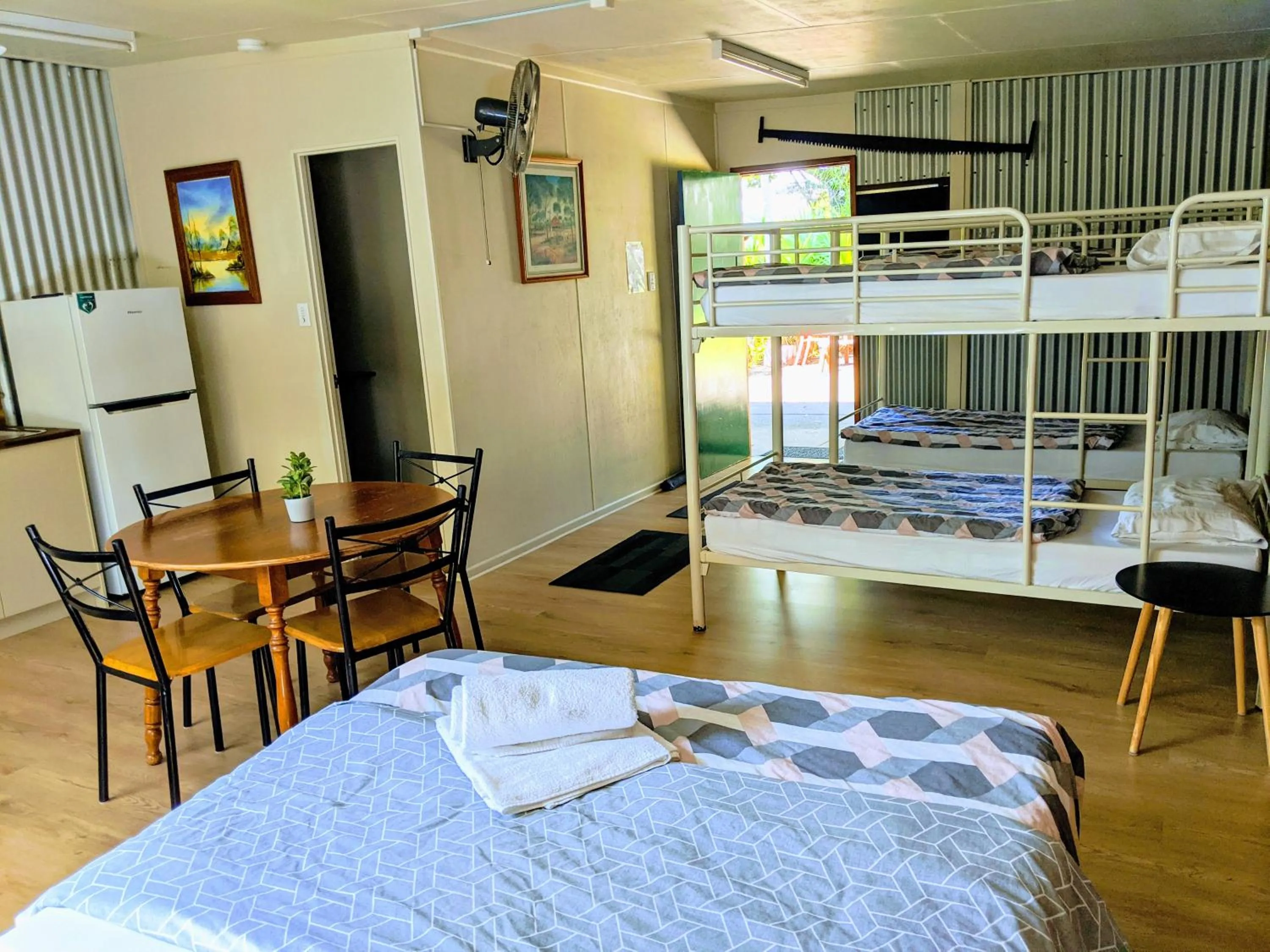 Bed in Woolshed Eco Lodge