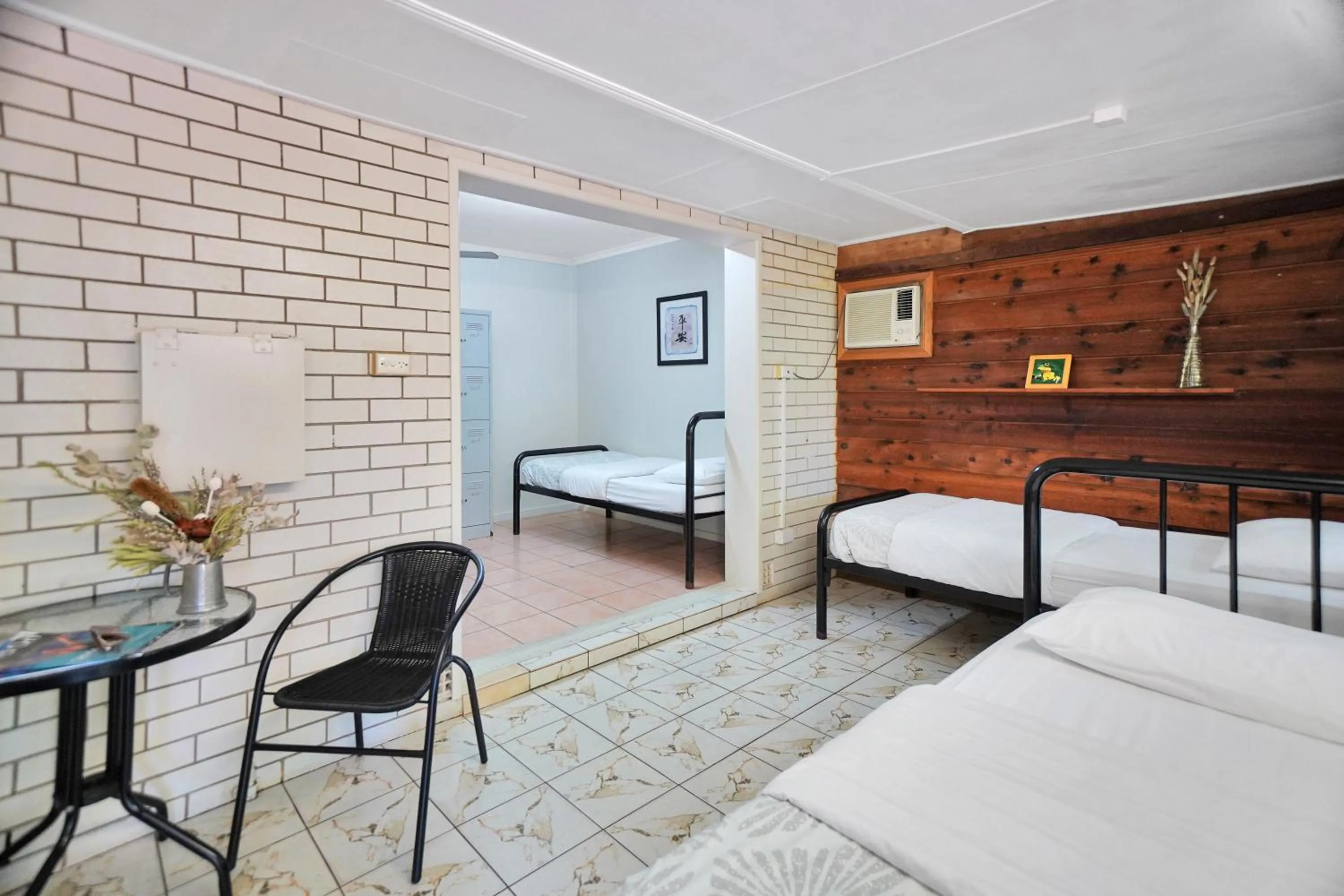 Bed in Woolshed Eco Lodge