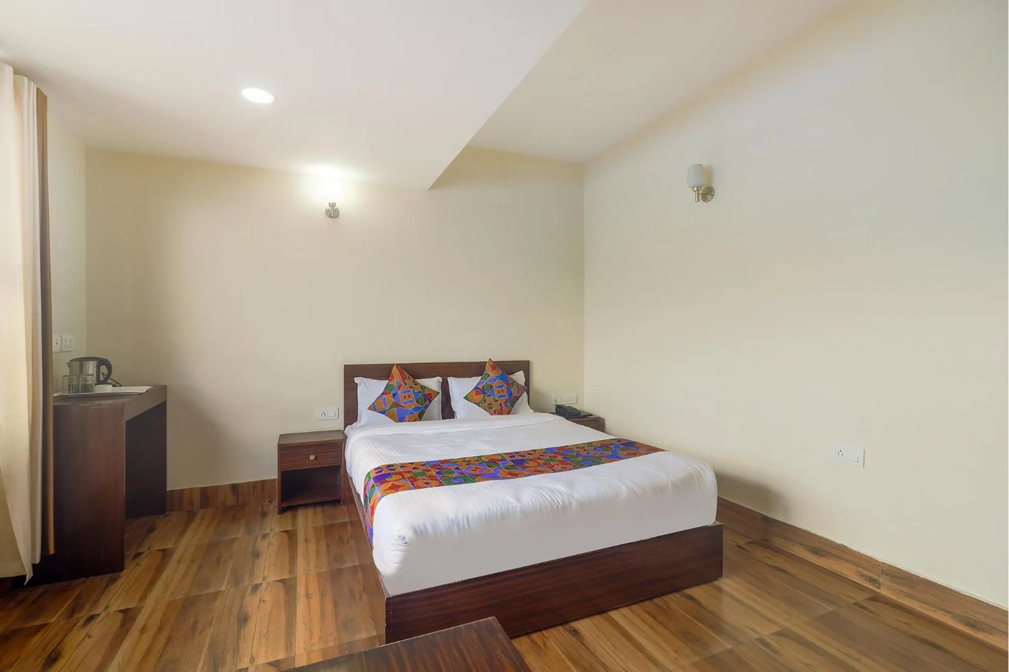 Bed in FabHotel Kutighar Regency