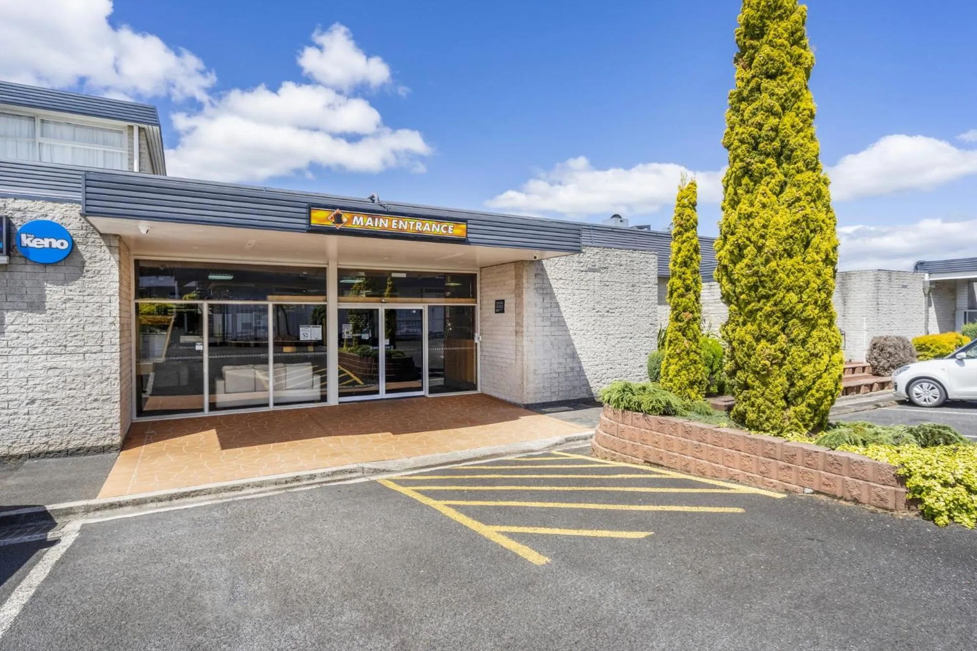 Property building in Top of the Town Hotel Motel