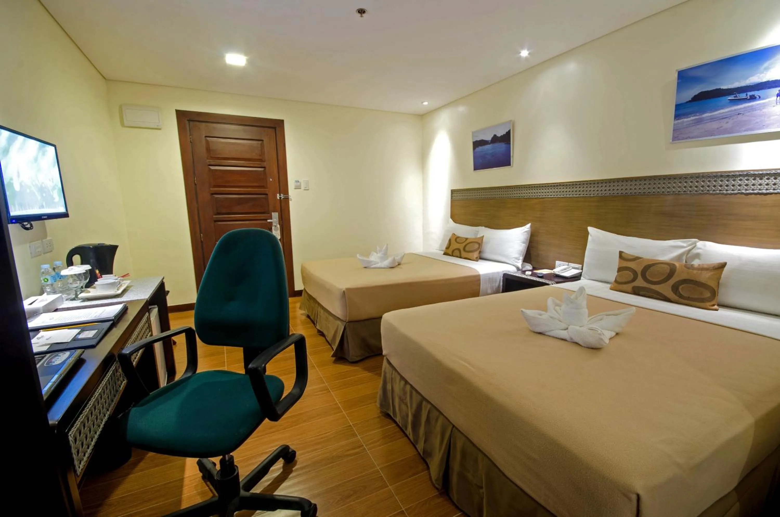 Photo of the whole room, Bed in Fersal Hotel - Puerto Princesa