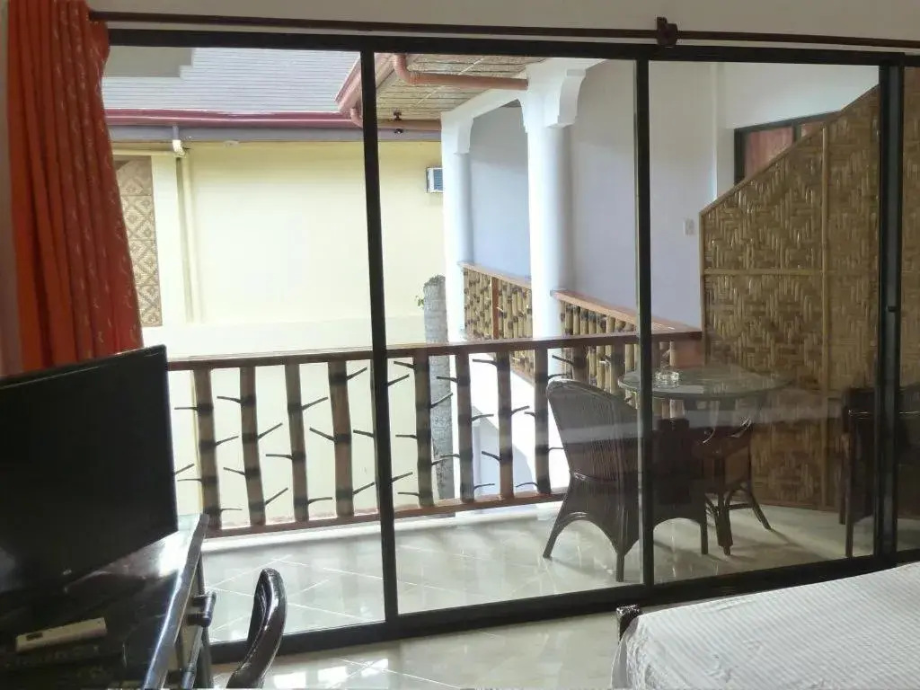Balcony/Terrace, Bed in Alona Vida Beach Resort Balcony/Terrace, Bed in Alona Vida Beach Resort